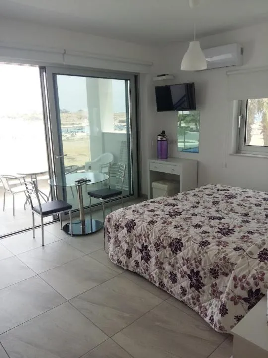 Bed in Christopher's Sandy Beach Suites