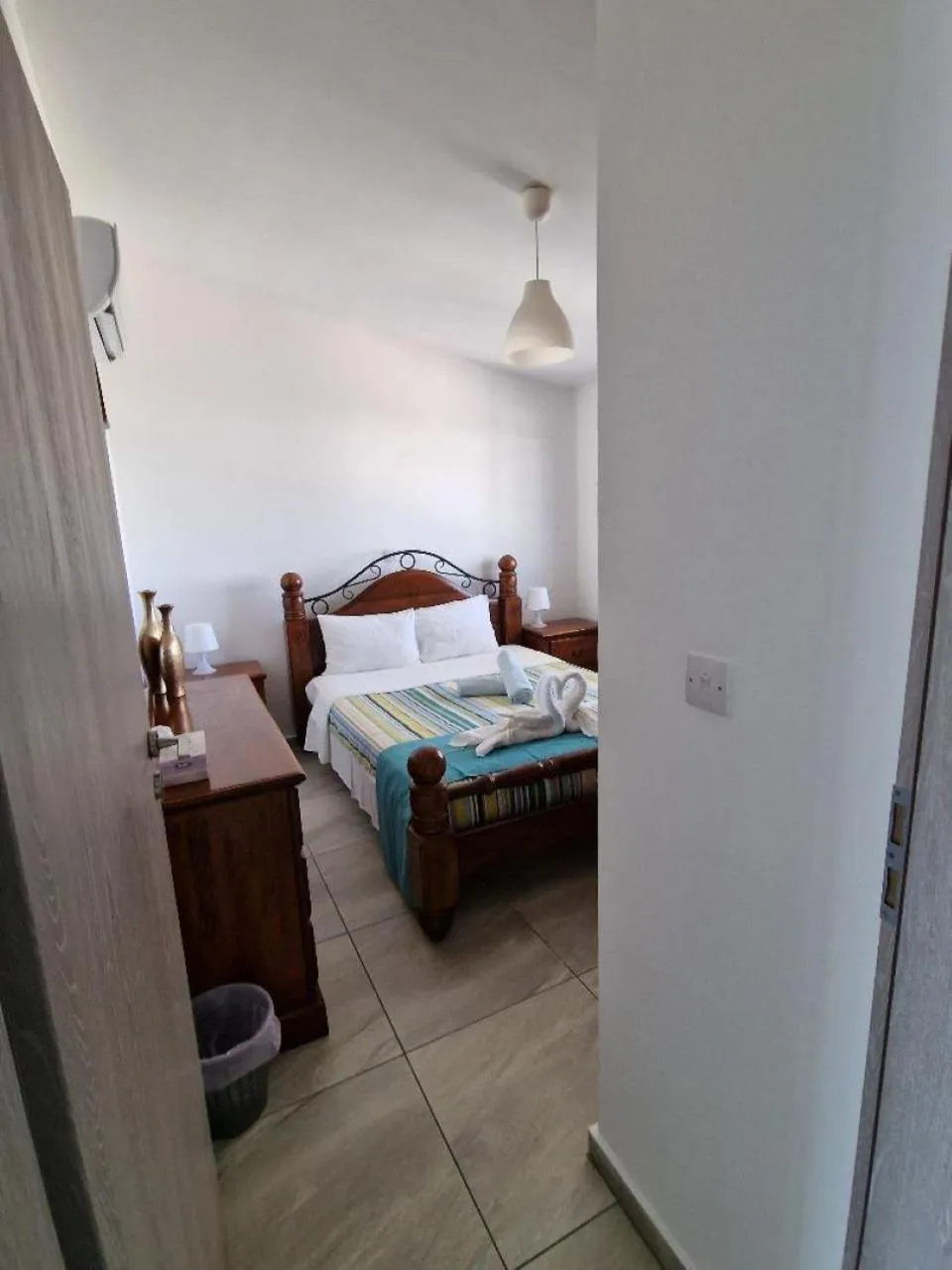 Bed in Christopher's Sandy Beach Suites