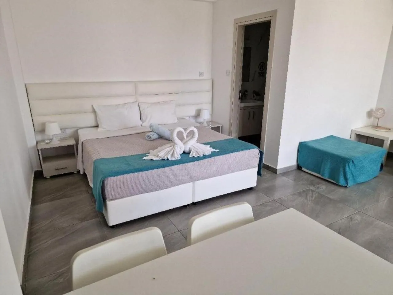 Bed in Christopher's Sandy Beach Suites