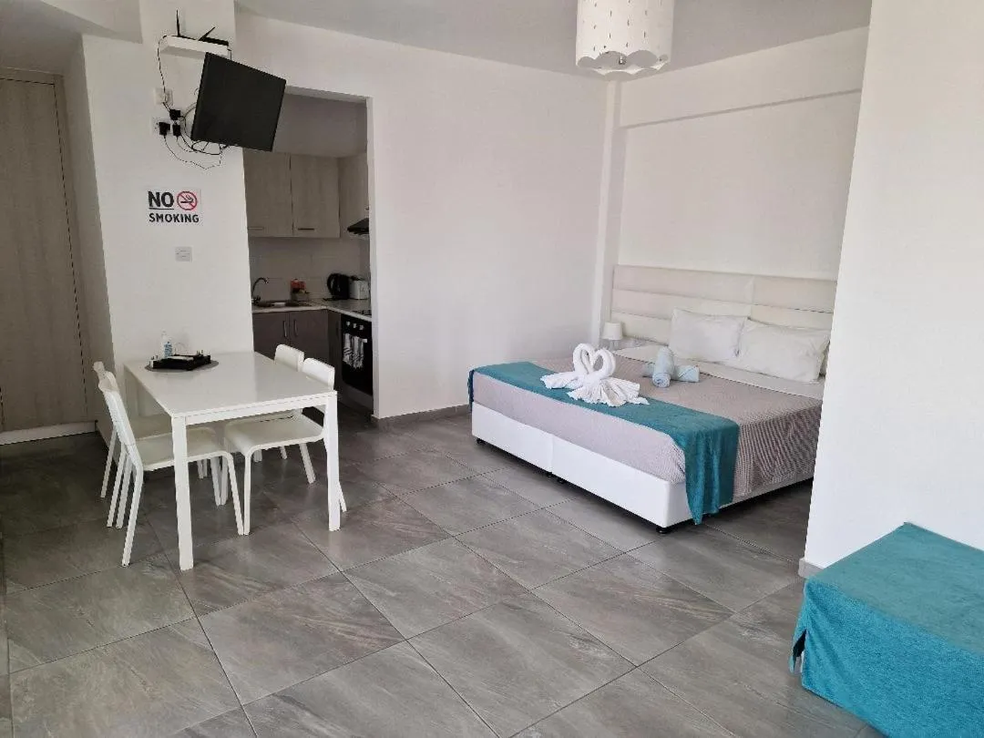 Bed in Christopher's Sandy Beach Suites