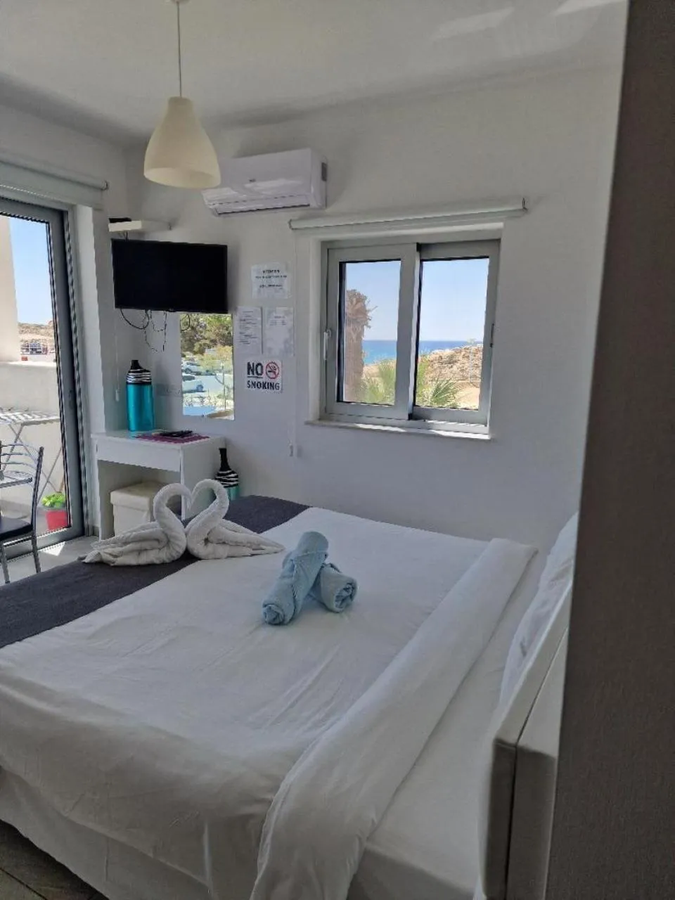 Bed in Christopher's Sandy Beach Suites