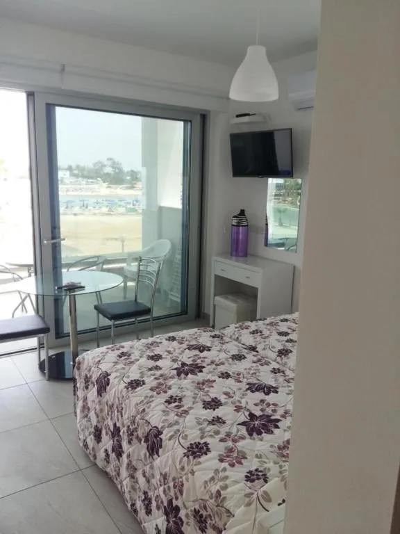 Bed in Christopher's Sandy Beach Suites