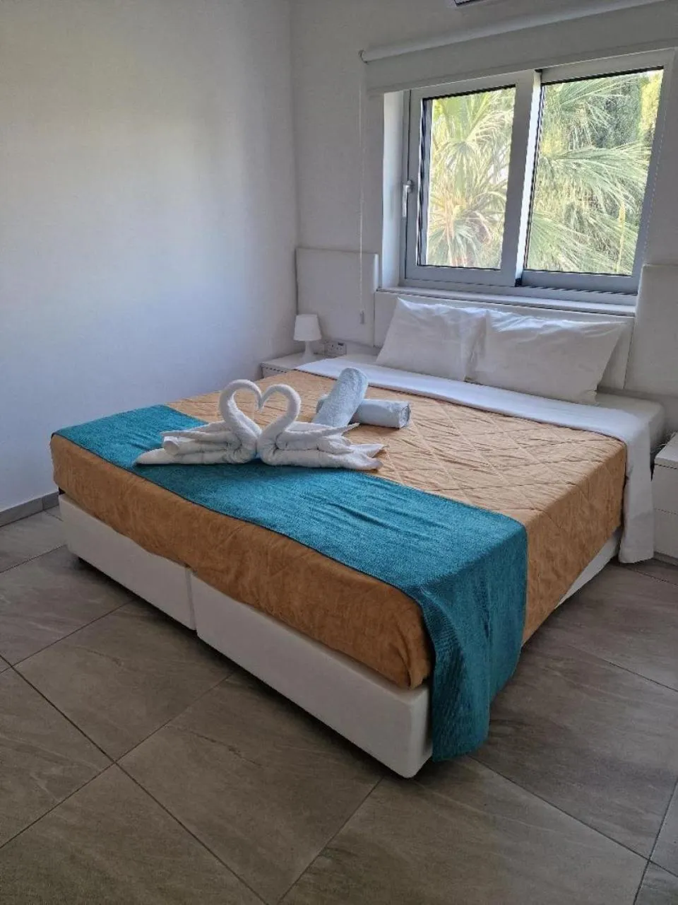 Bed in Christopher's Sandy Beach Suites