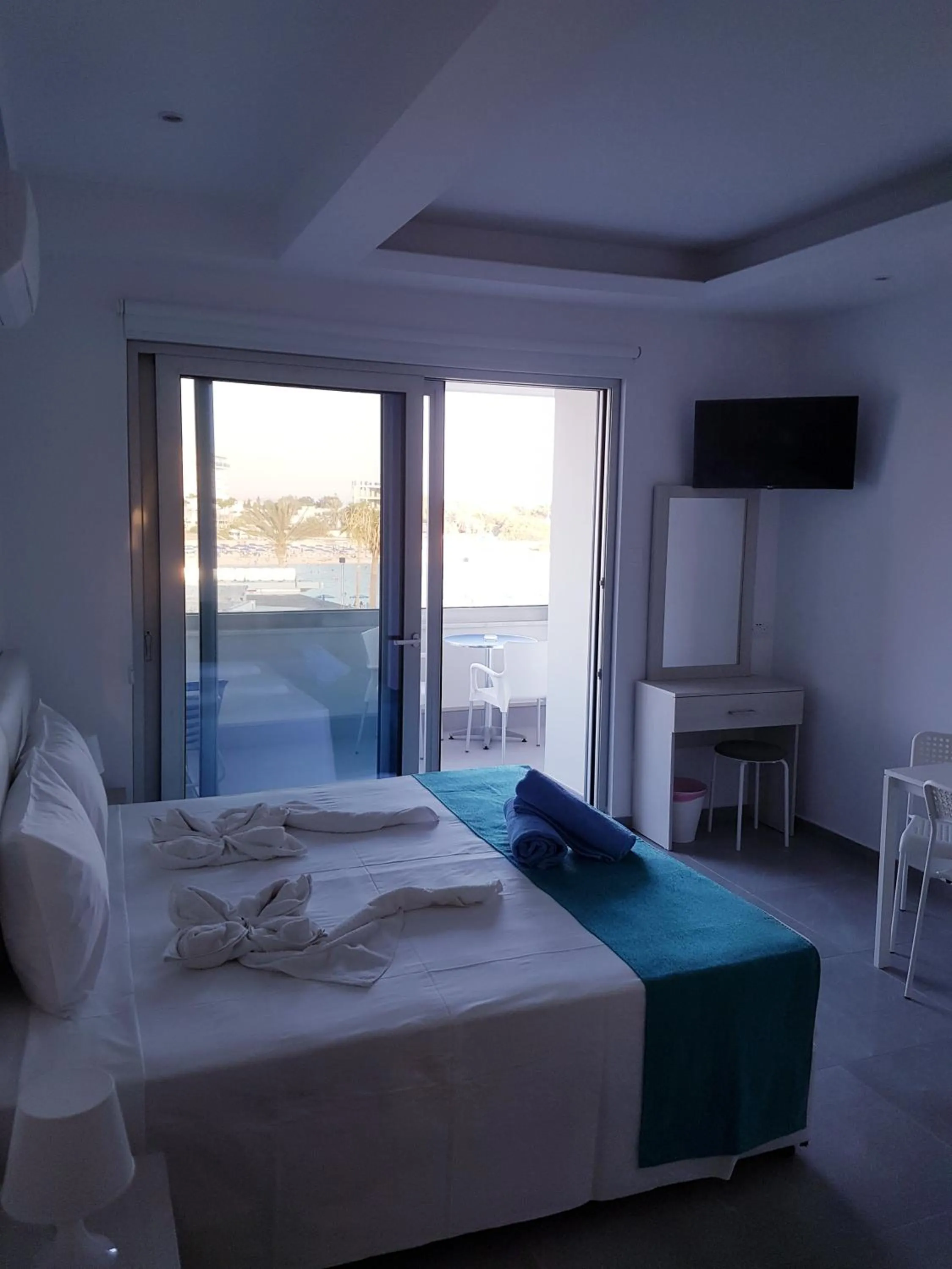 Bed in Christopher's Sandy Beach Suites