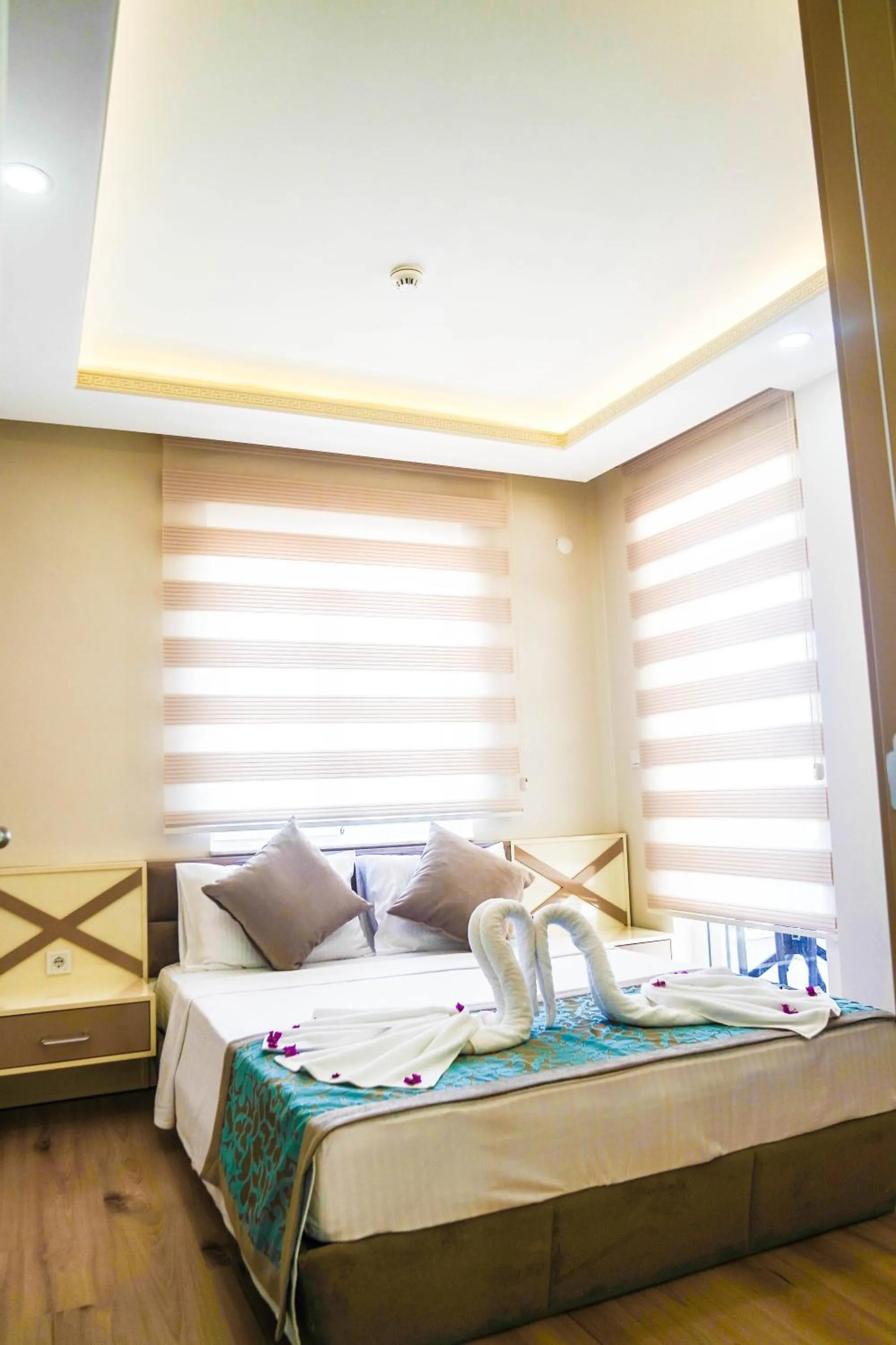 Bed in Ale Apartments Hotel