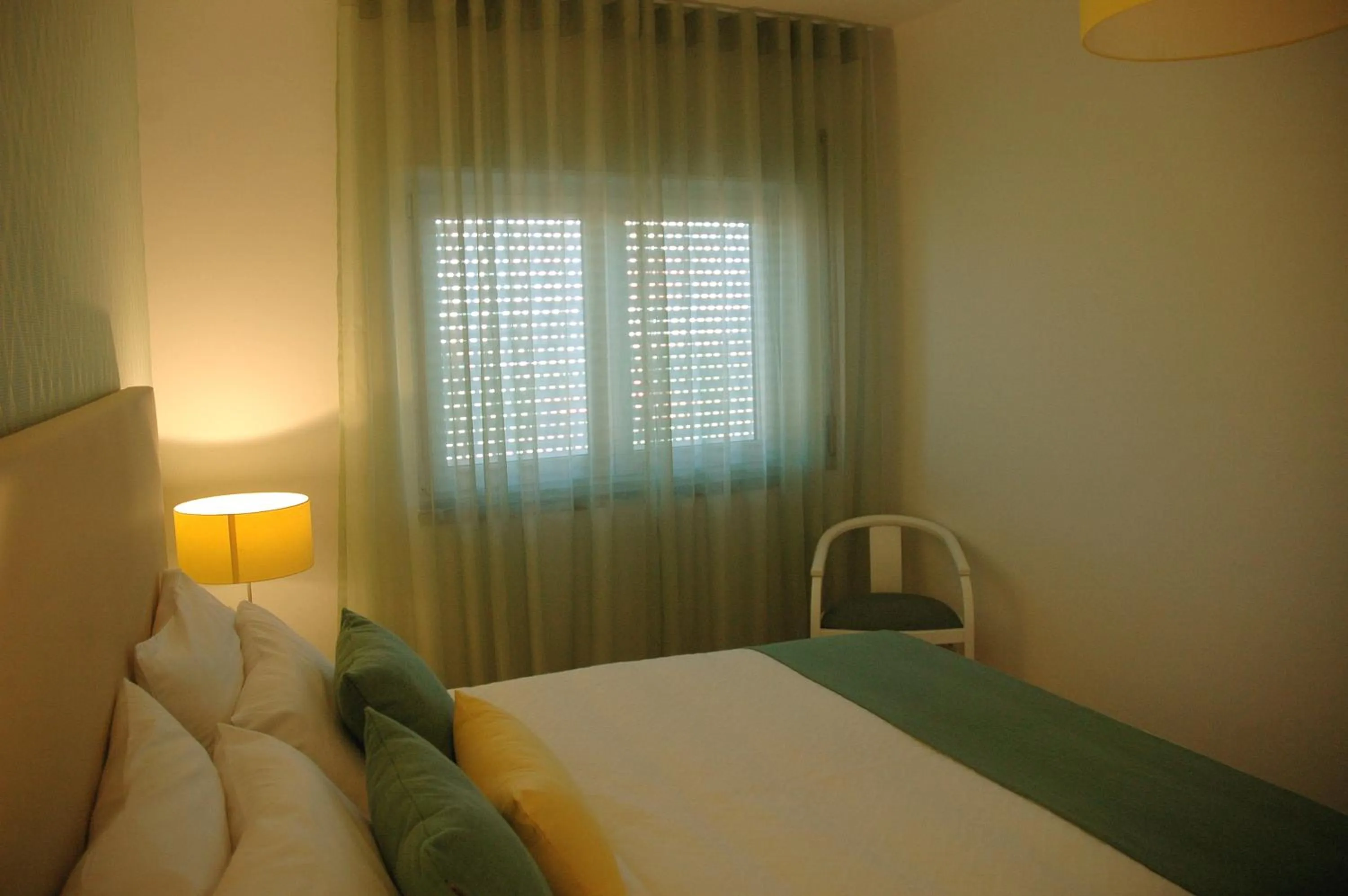 Bed in Hotel Dom Lourenco