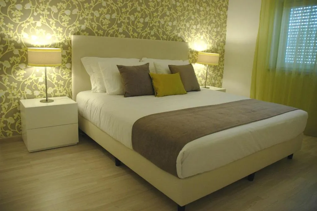 Bed in Hotel Dom Lourenco