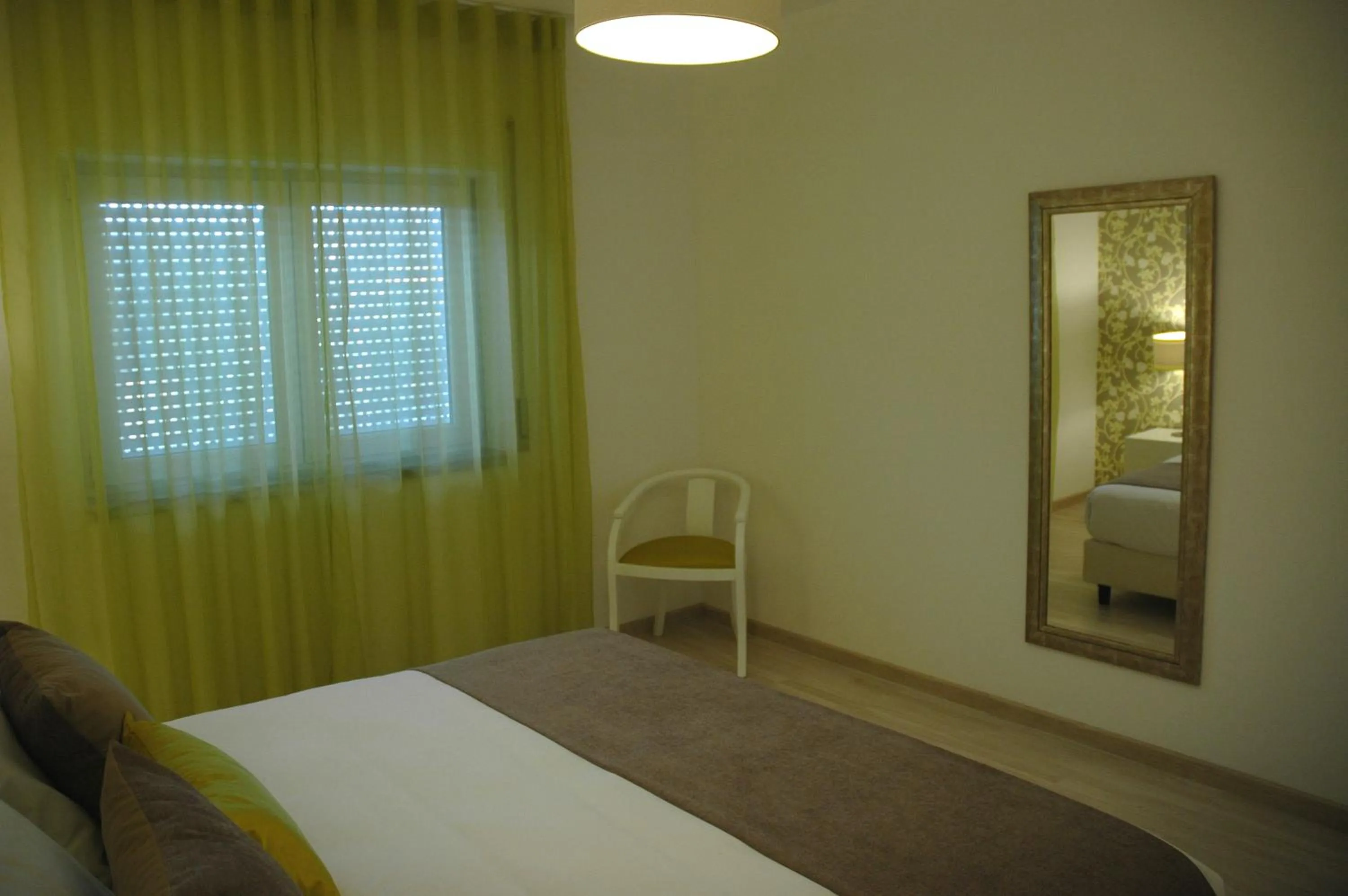 Bed in Hotel Dom Lourenco