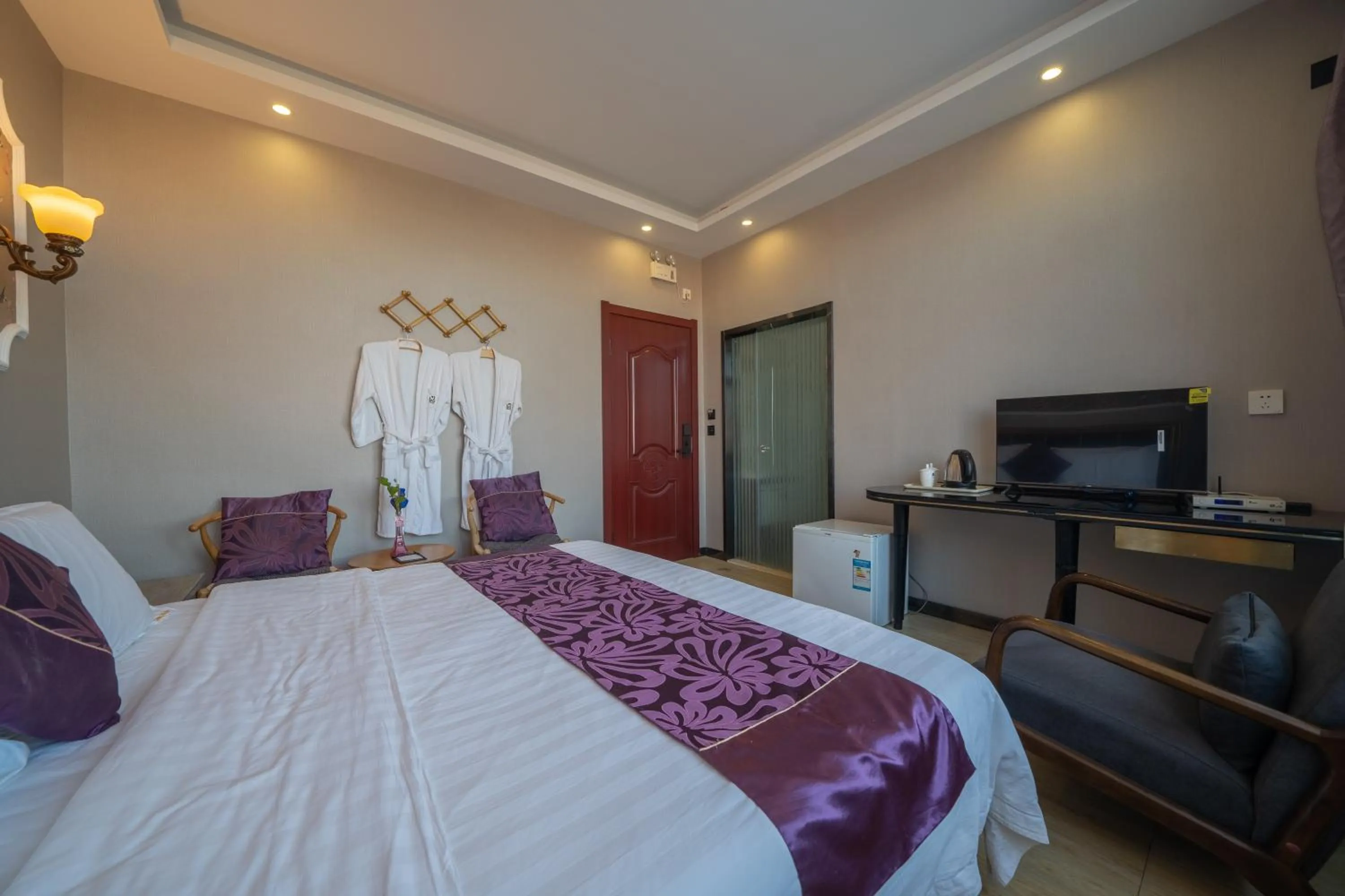 Bed in XinQihang Hotel Harbin Taiping Airport