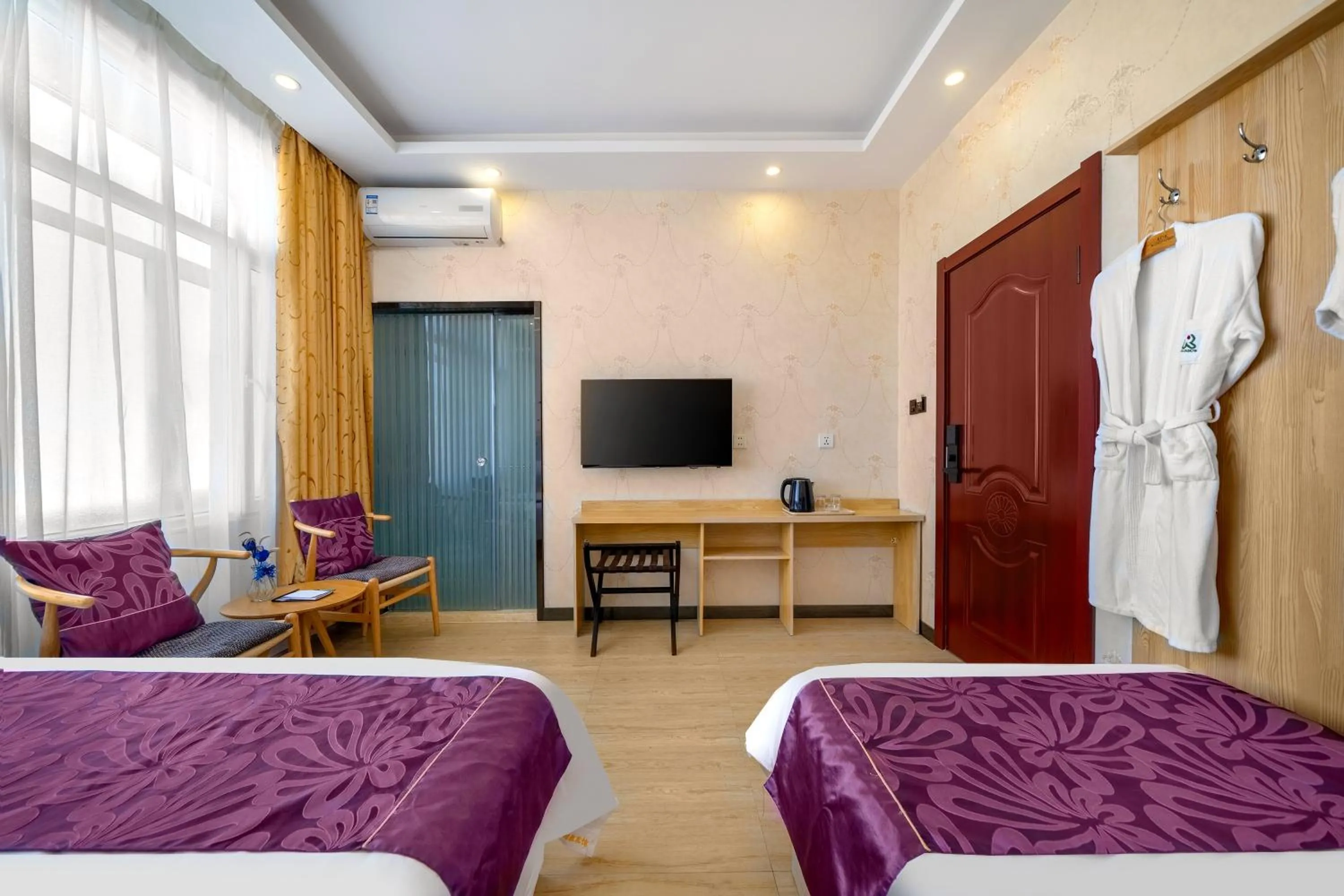 TV and multimedia, Bed in XinQihang Hotel Harbin Taiping Airport