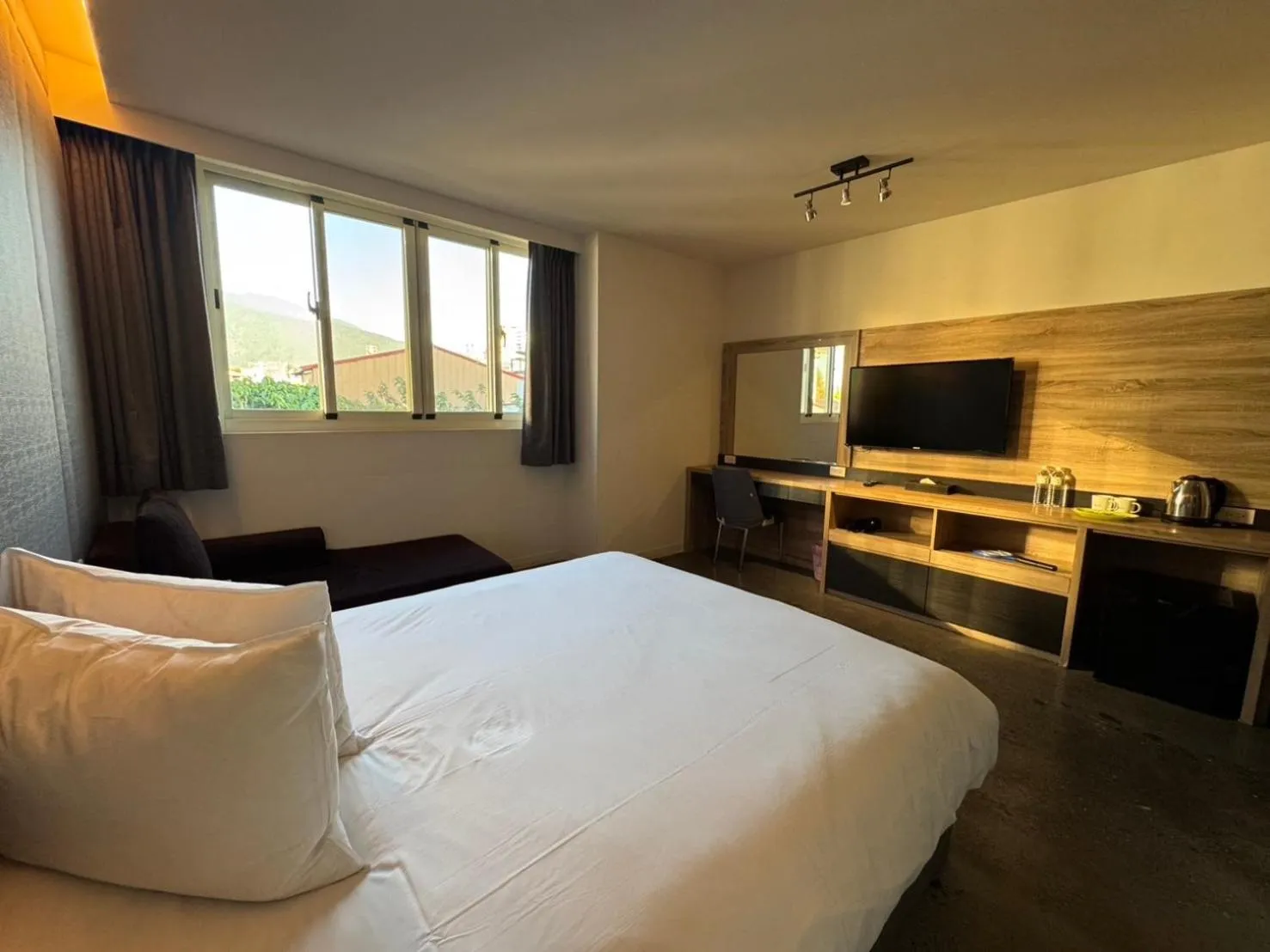 Photo of the whole room, Bed in Travel Light Hotel