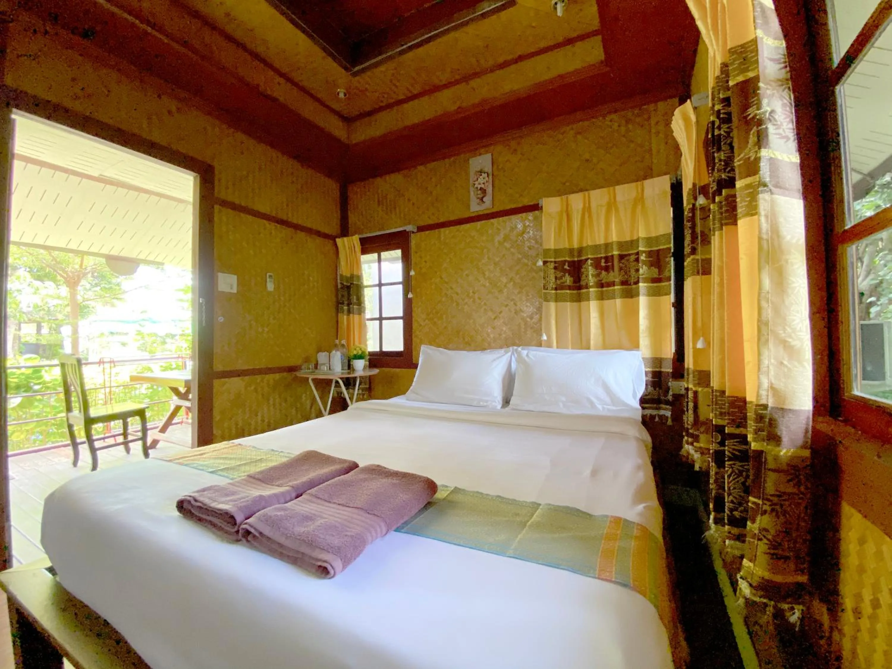 Bed in Everest Resort Samui - SHA Plus