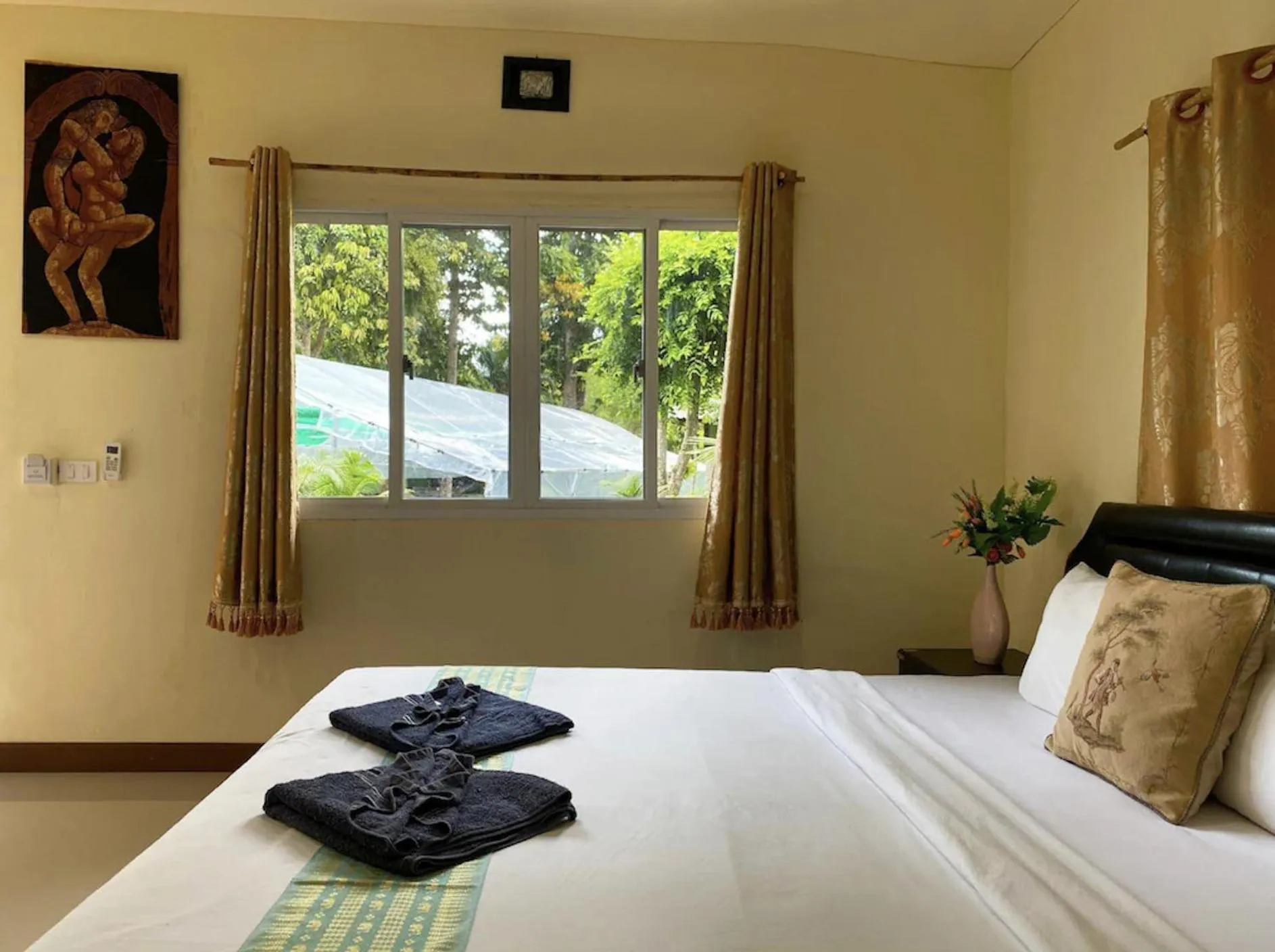 Bed in Everest Resort Samui - SHA Plus