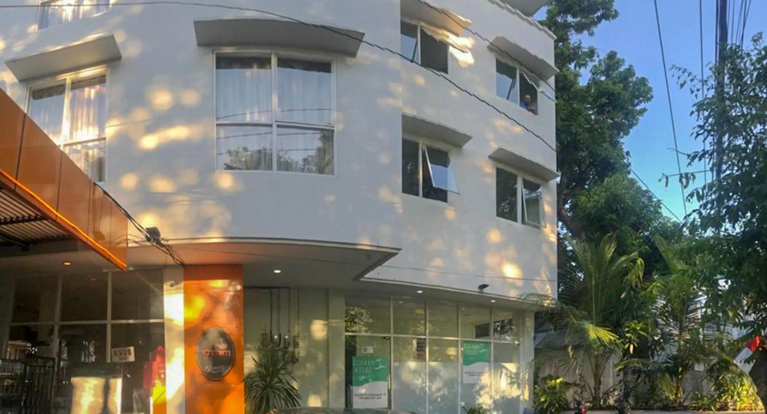 Property logo or sign in RedDoorz Hostel @ Manado Green Hostel