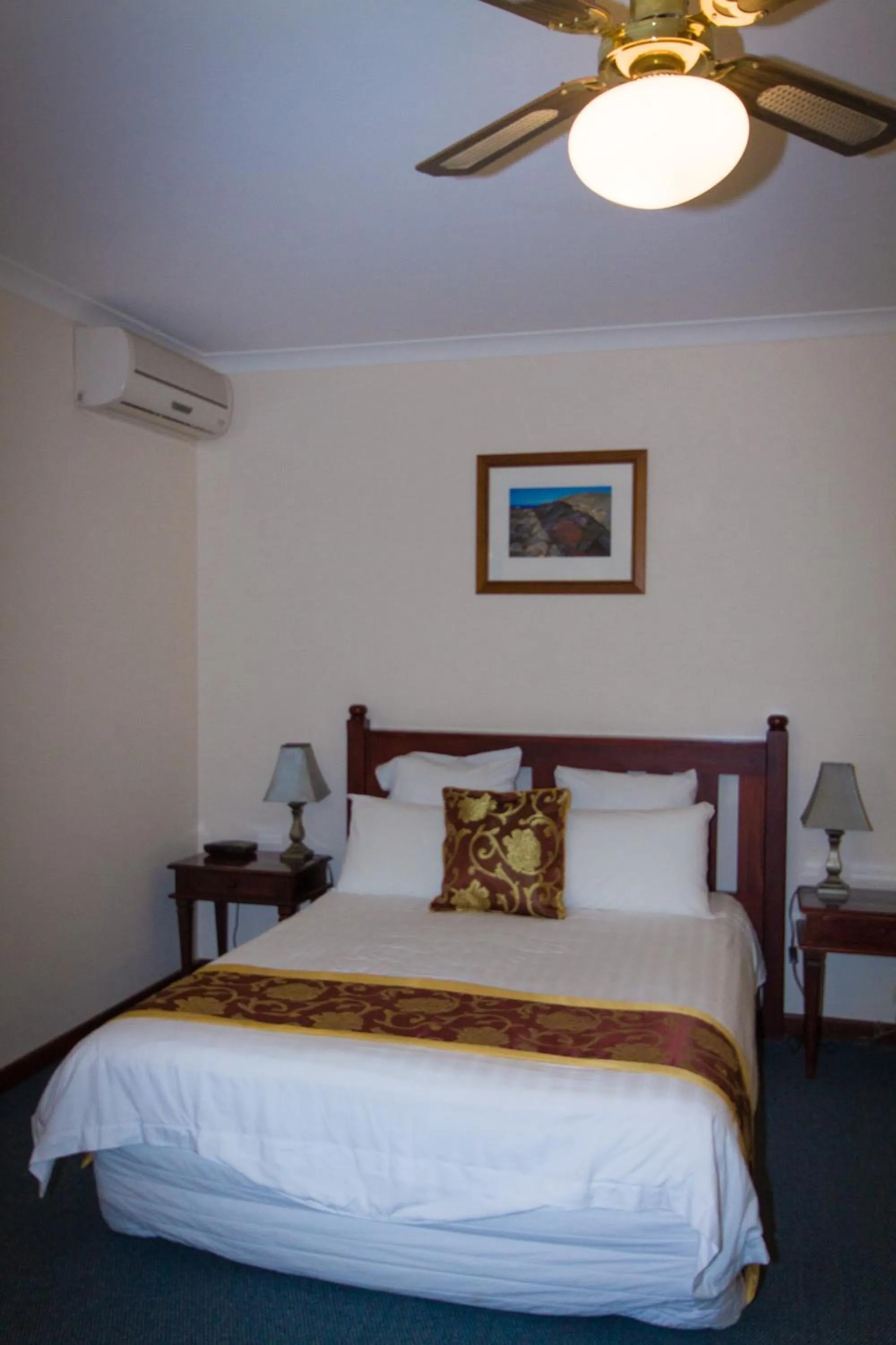 Bed in Tree Top Walk Motel