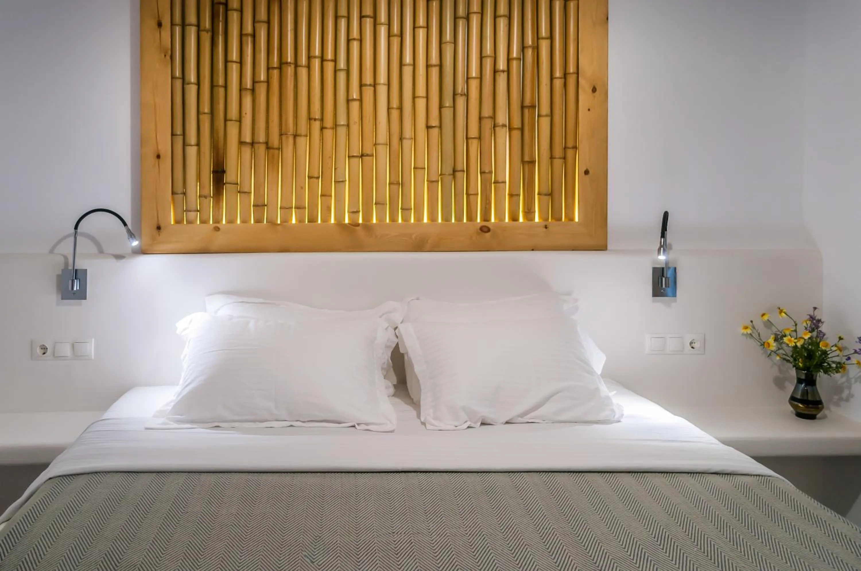 Bed in Vilos Suites