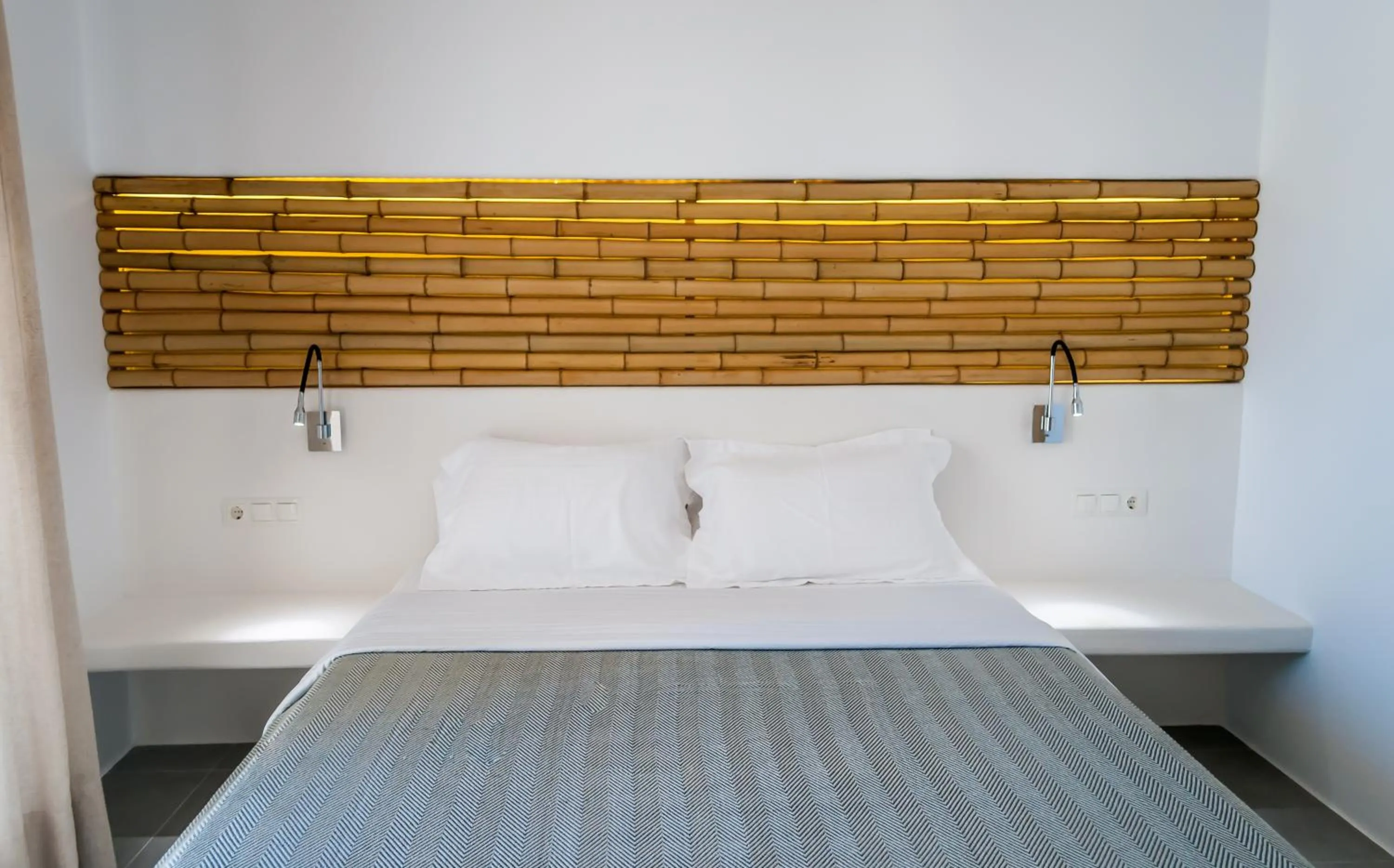 Bed in Vilos Suites