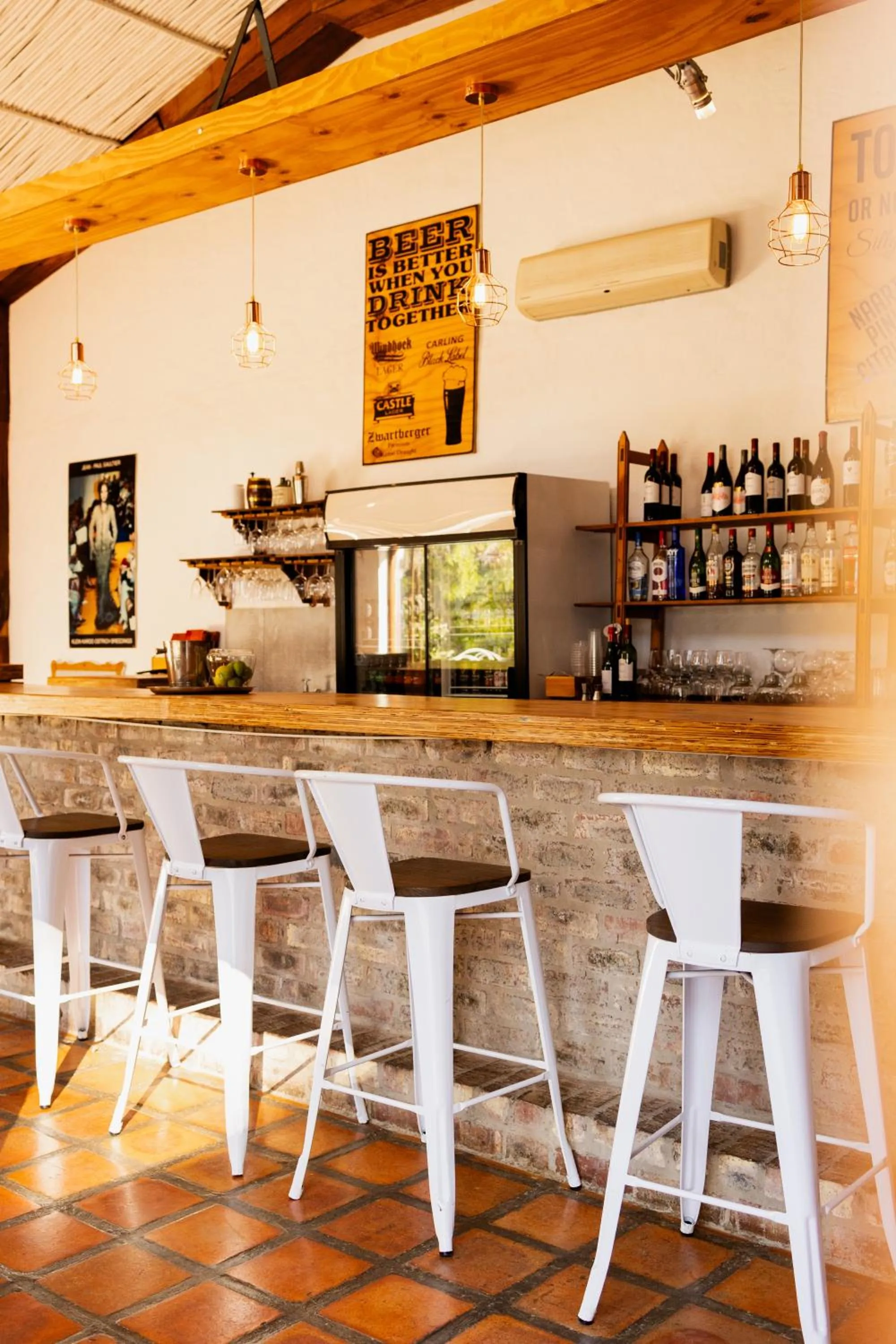 Lounge or bar in De Opstal Country Lodge