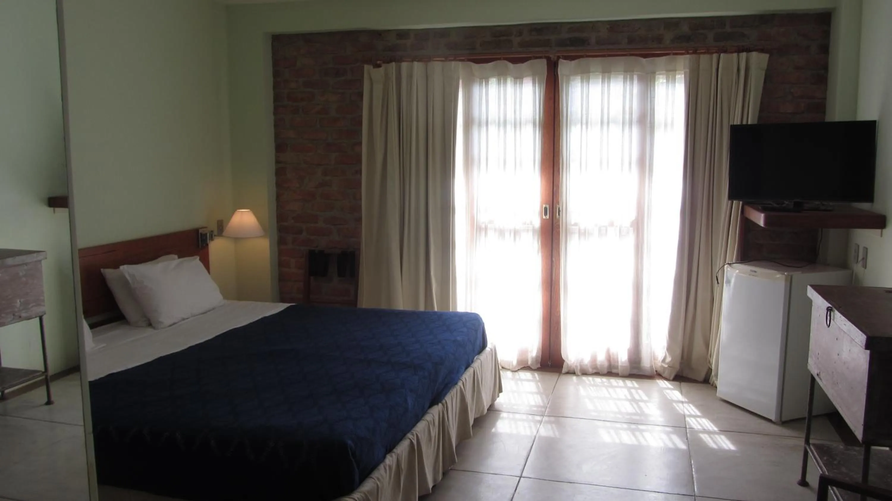 Bed in Pousada Pilar