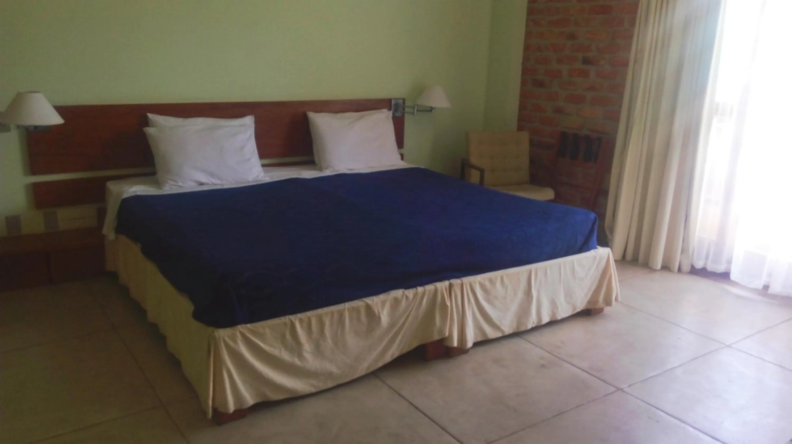 Bed in Pousada Pilar