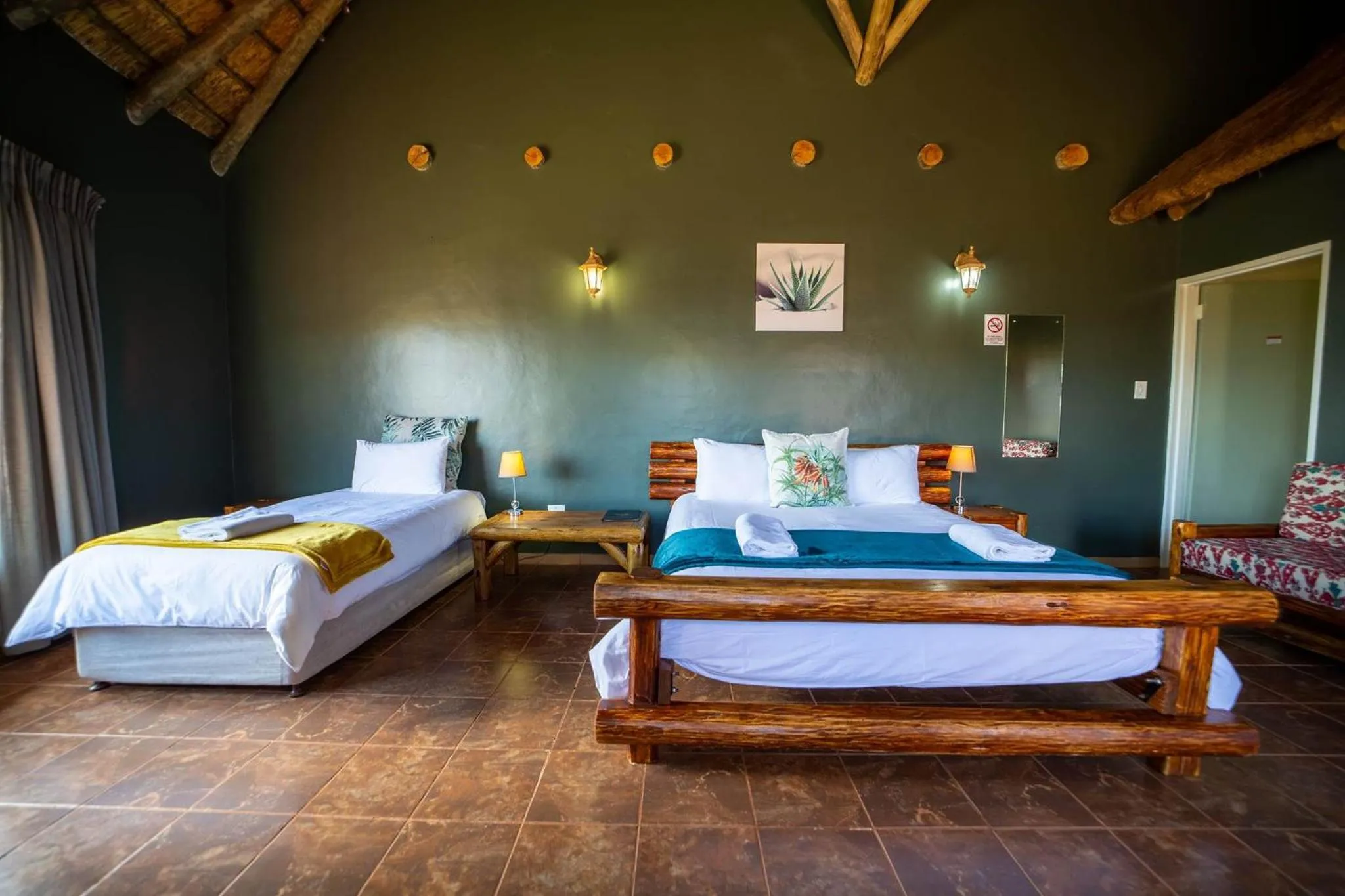 Photo of the whole room, Bed in Red Sands Country Lodge
