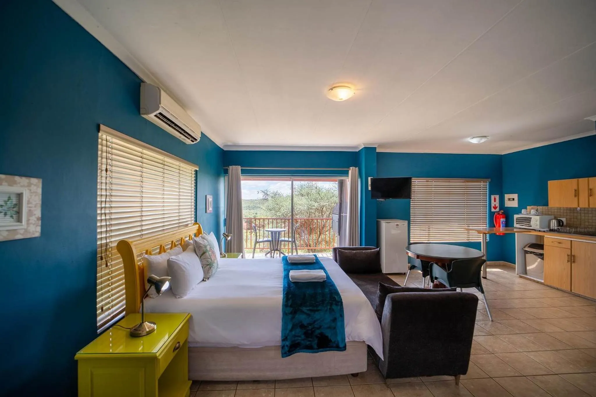 Photo of the whole room, Bed in Red Sands Country Lodge