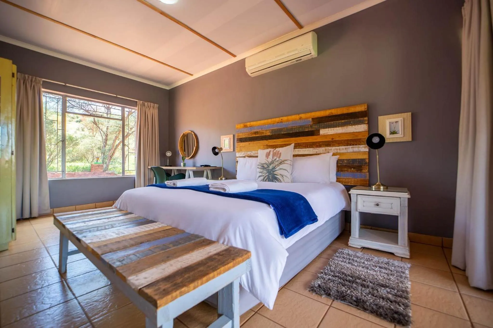 Photo of the whole room, Bed in Red Sands Country Lodge