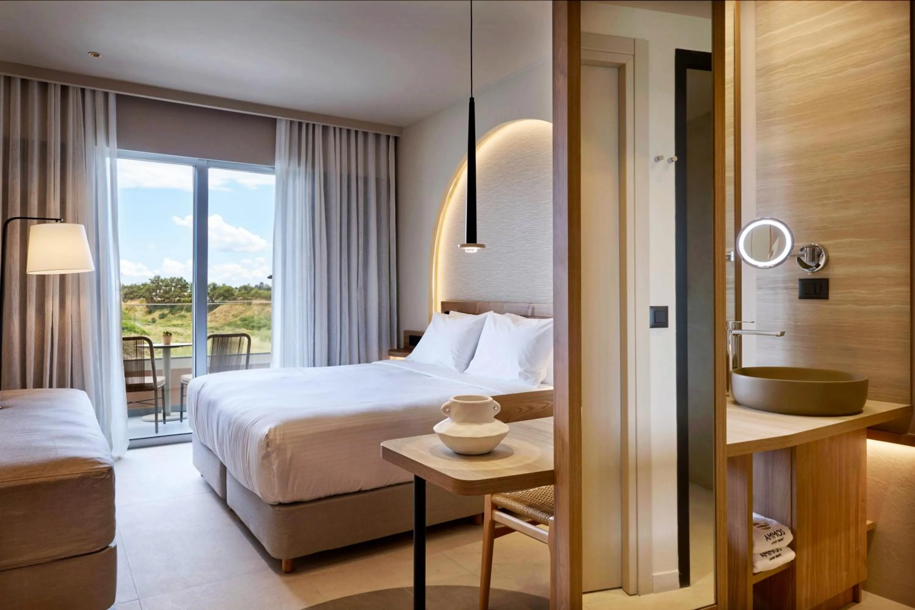 Bed in Ammos Luxury Resort