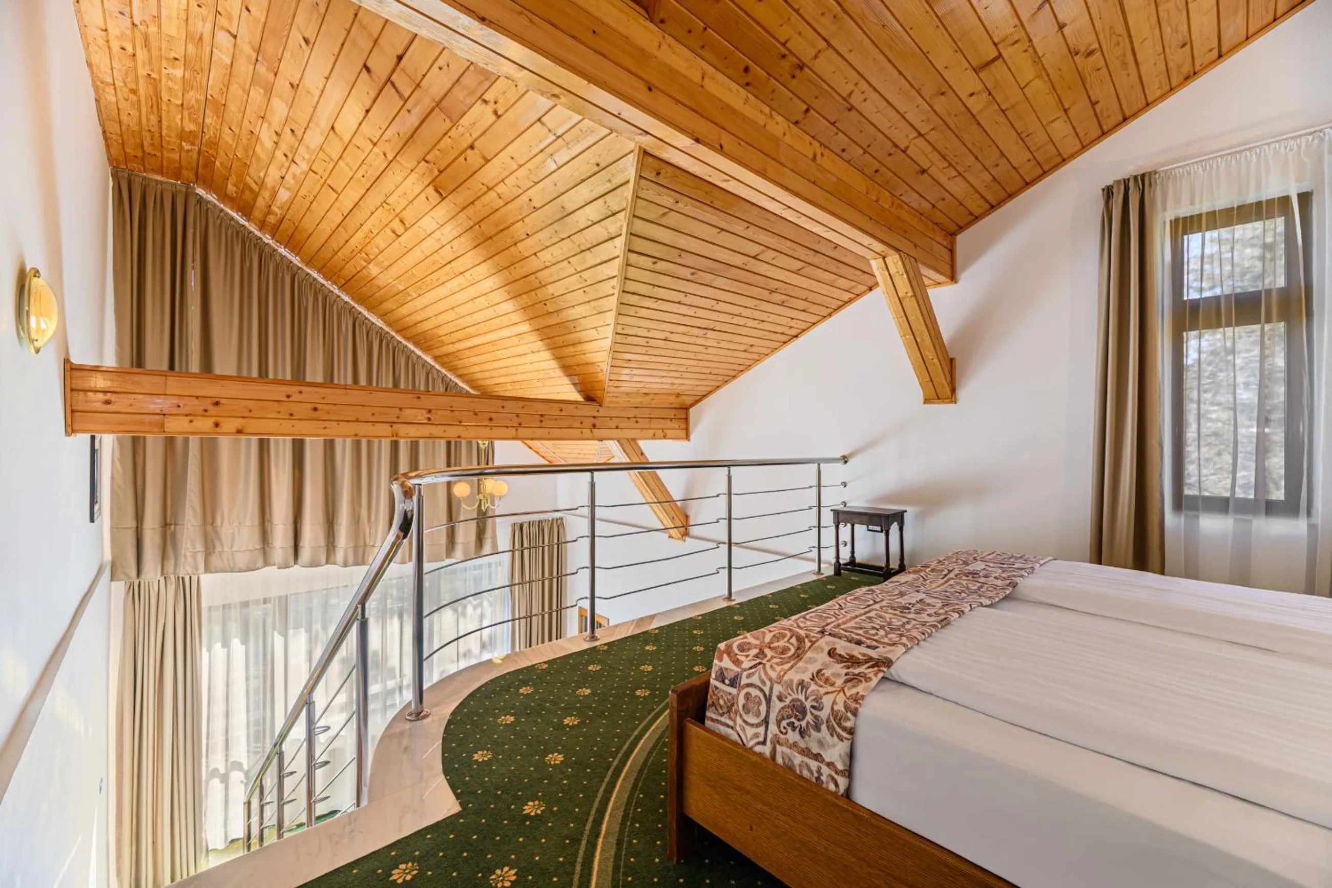 Bed in Hotel Casa Viorel jacuzzi & saunas