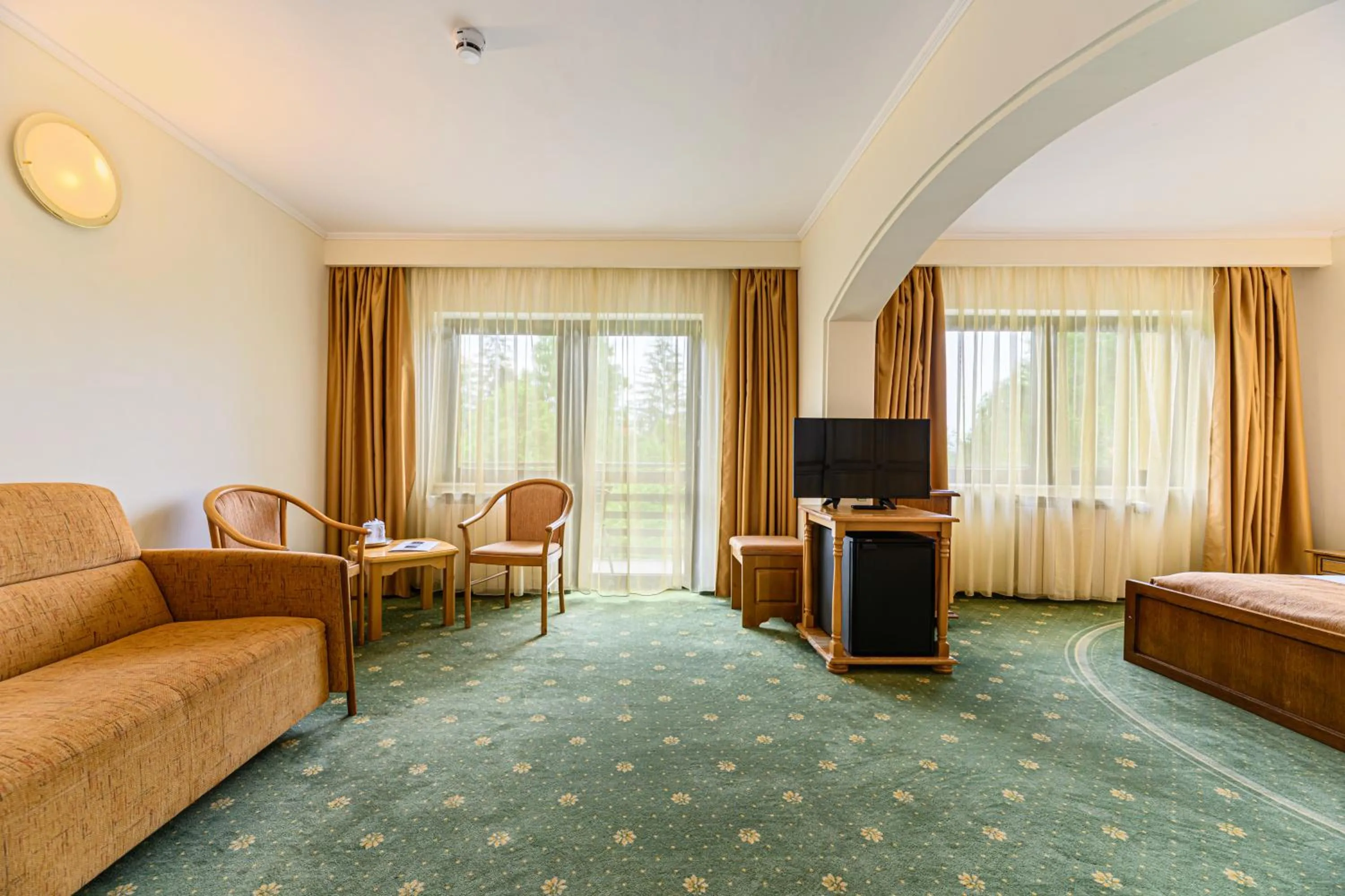 Bed in Hotel Casa Viorel jacuzzi & saunas