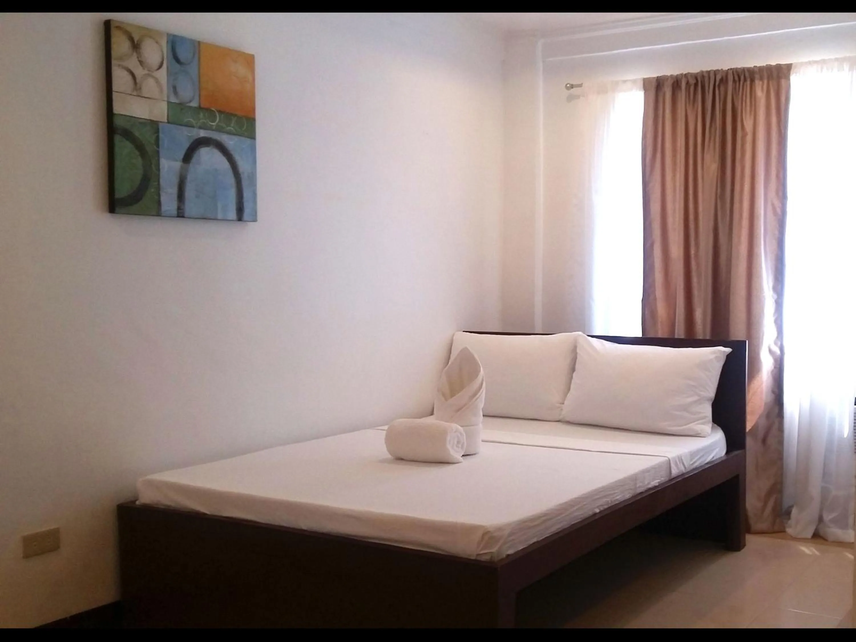 Bed in Ricardo Valley Inn