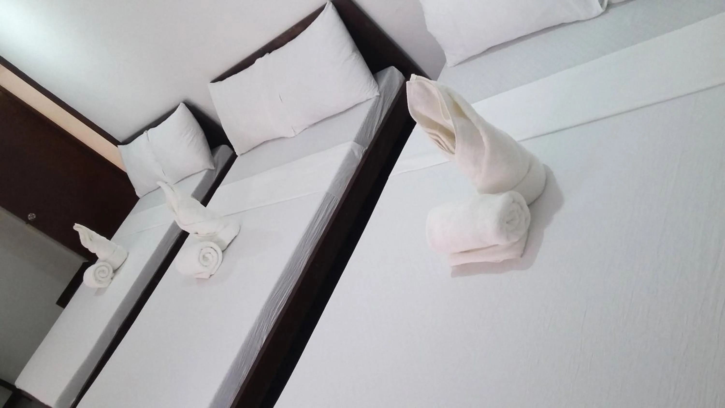 Bed in Ricardo Valley Inn