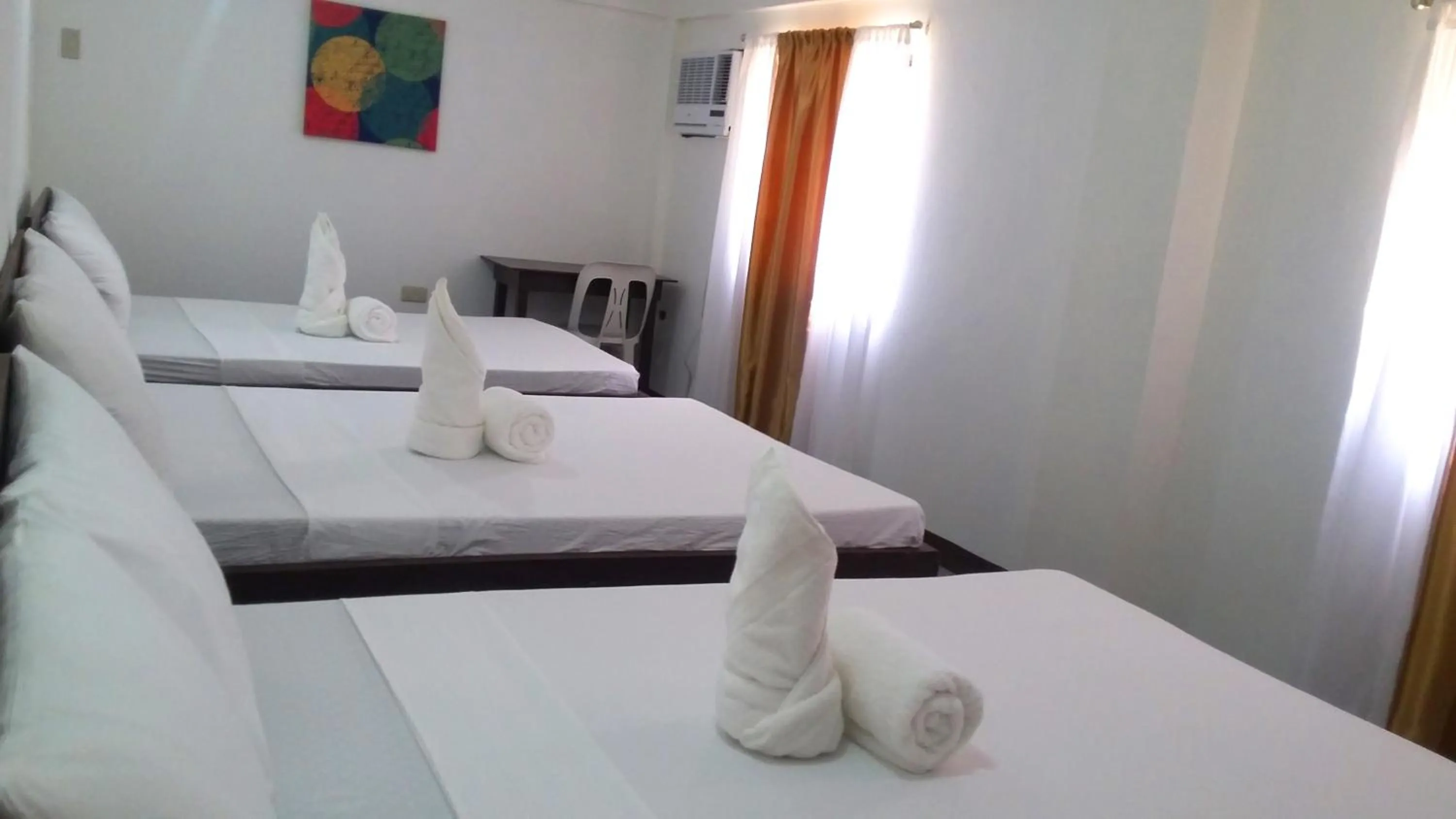 Bed in Ricardo Valley Inn