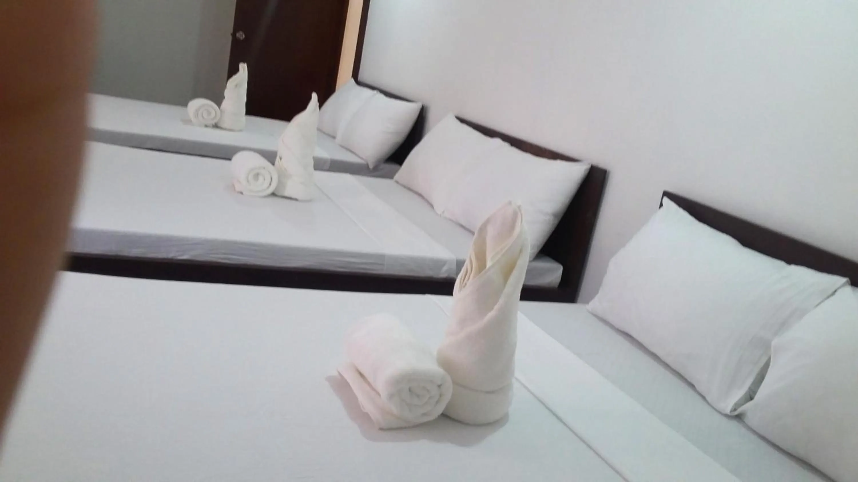 Bed in Ricardo Valley Inn