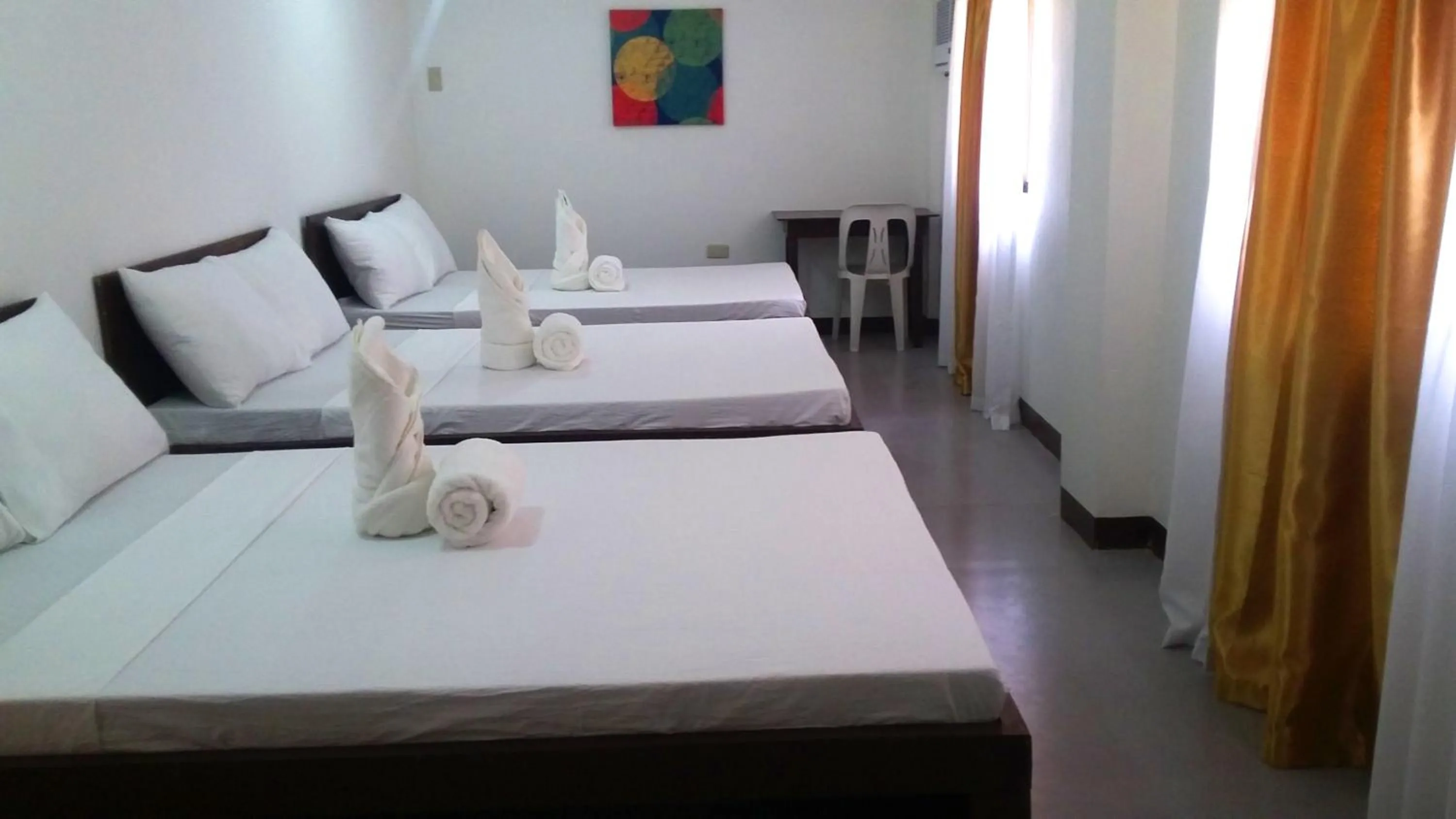 Bed in Ricardo Valley Inn