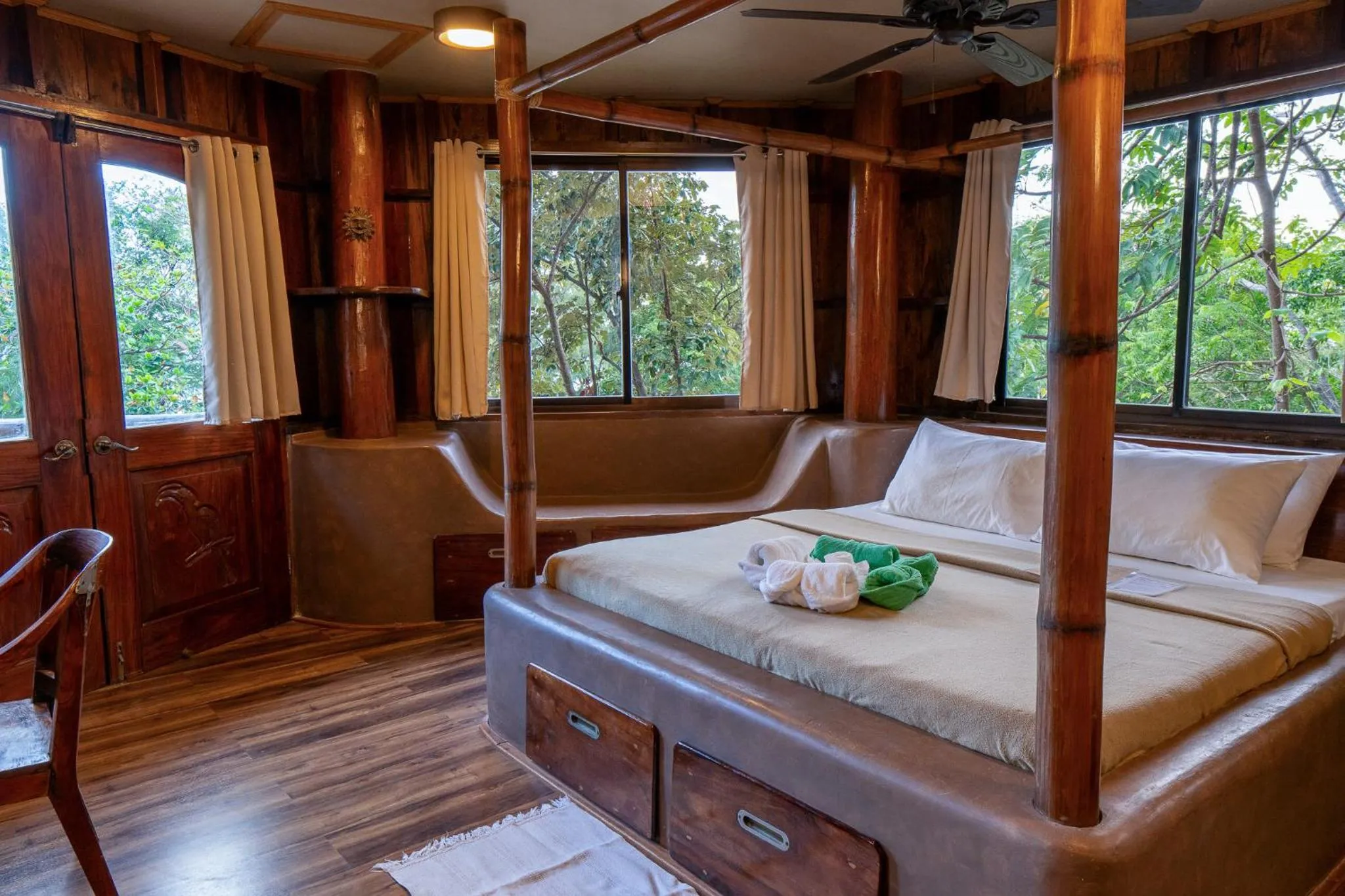 Bed in Sangat Island Dive Resort