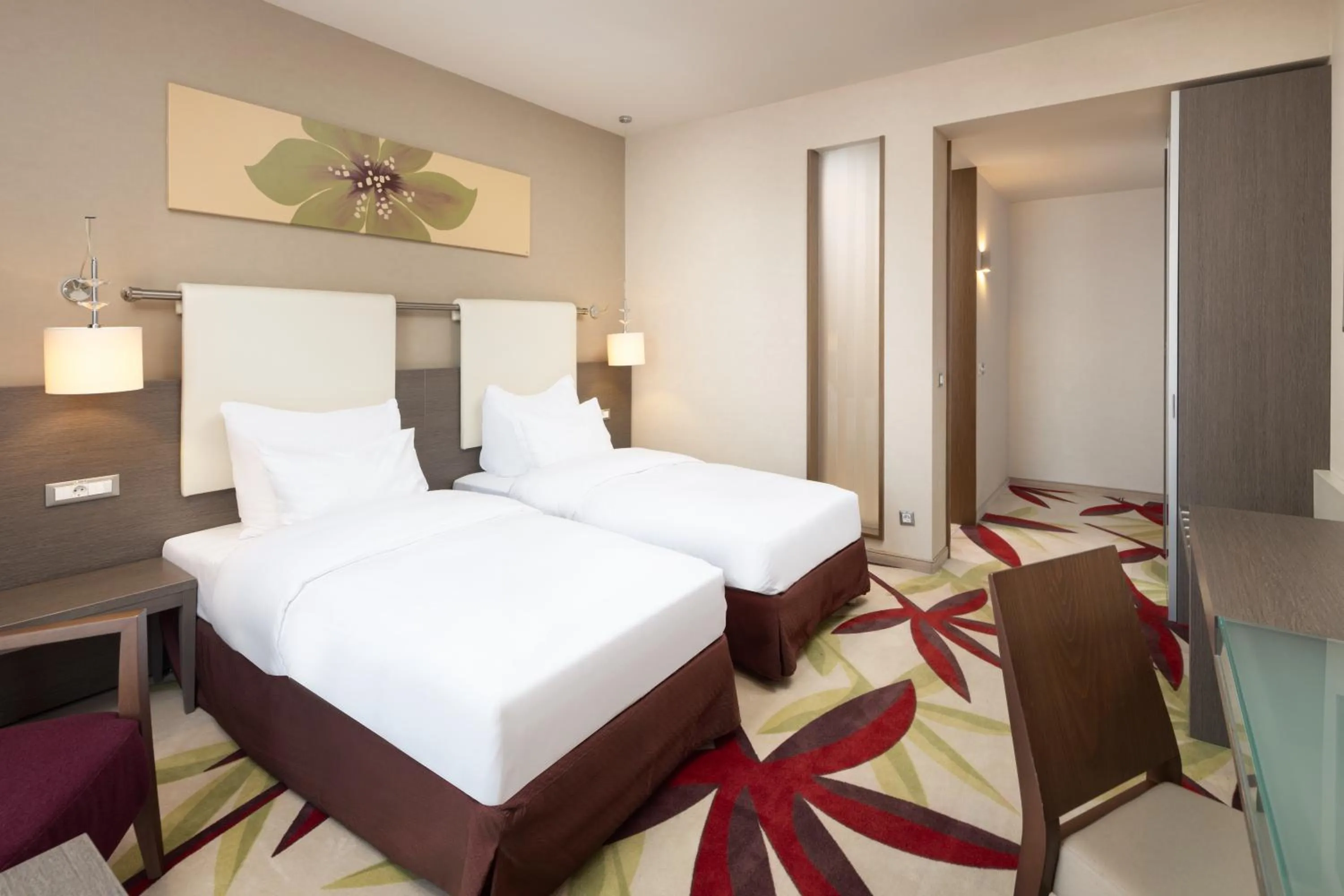 Bed in Golden Tulip Ana Dome Hotel