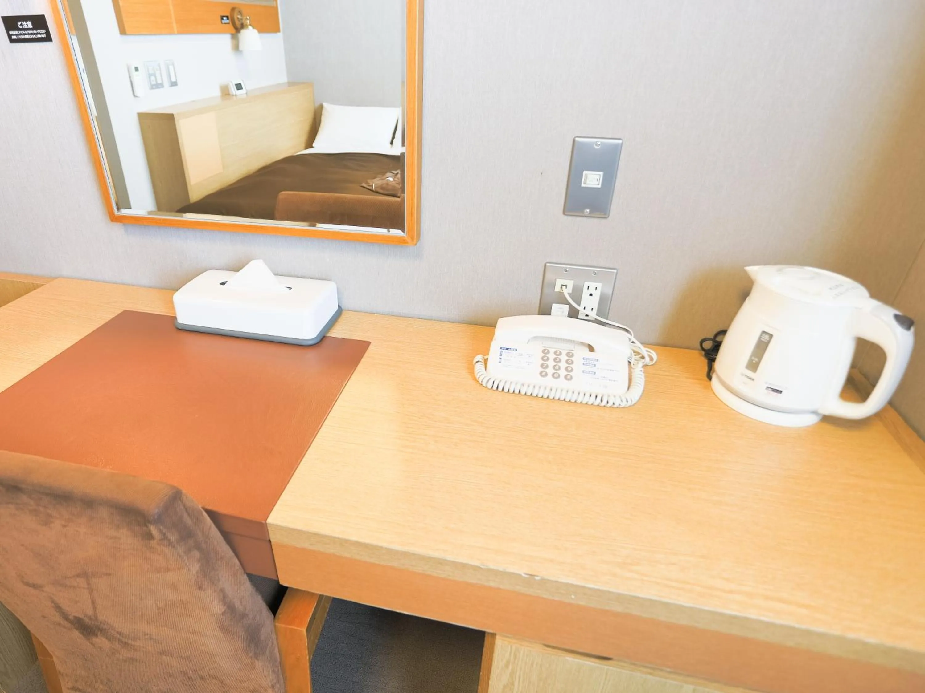 Bed in Castle Inn Sendai