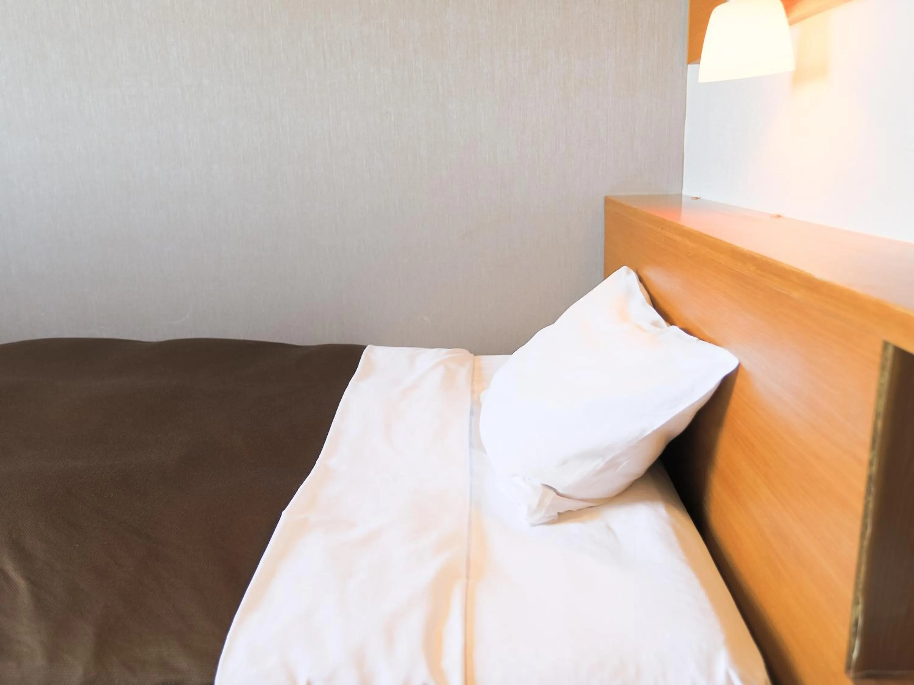 Bed in Castle Inn Sendai