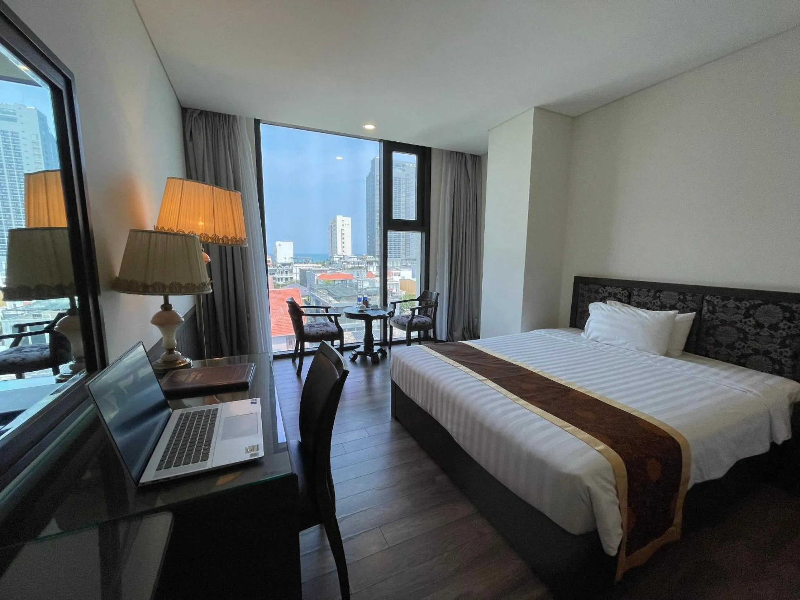 Seating area, Bed in Danaciti Hotel