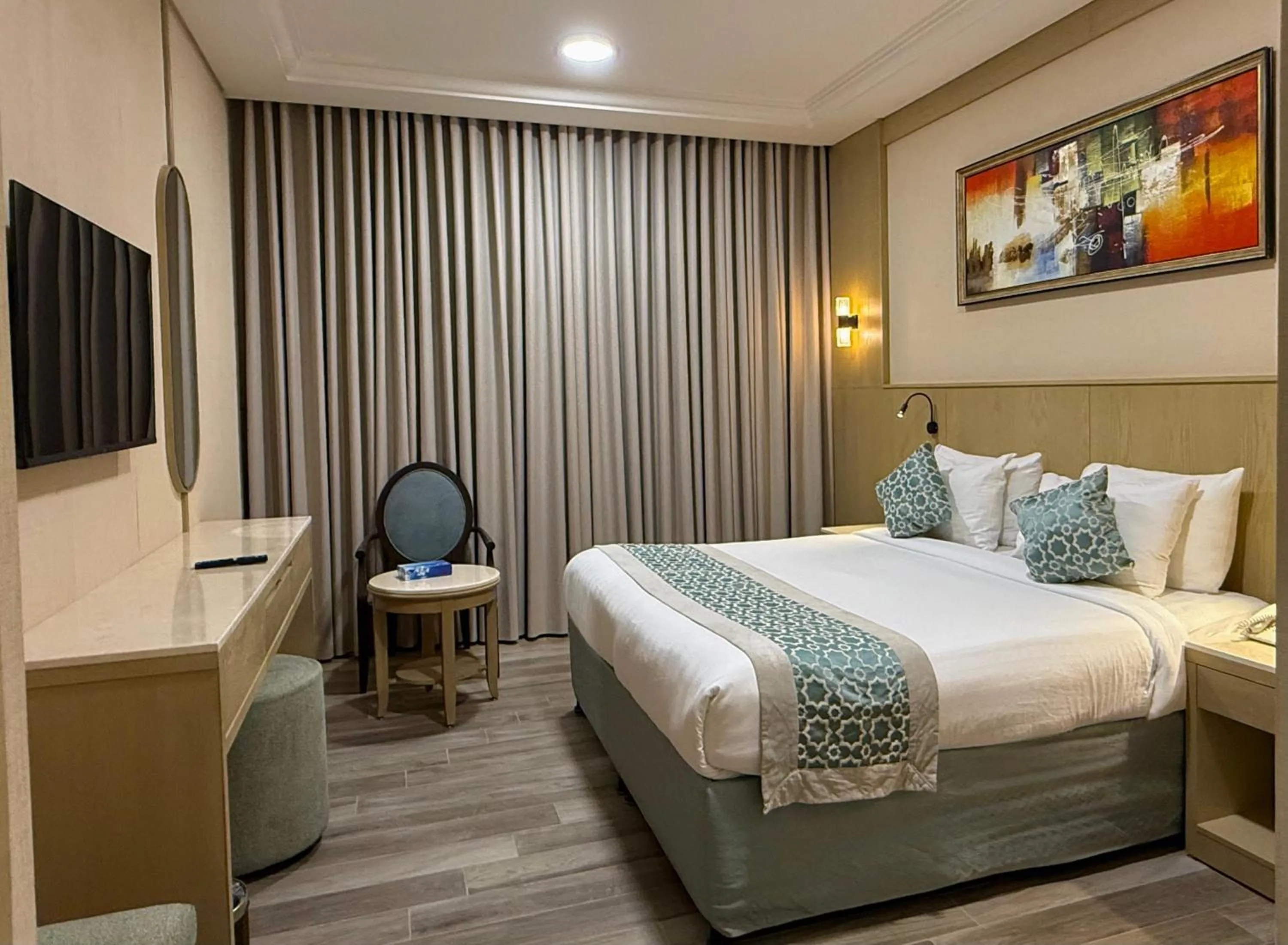 TV and multimedia, Bed in Afraa Hotel