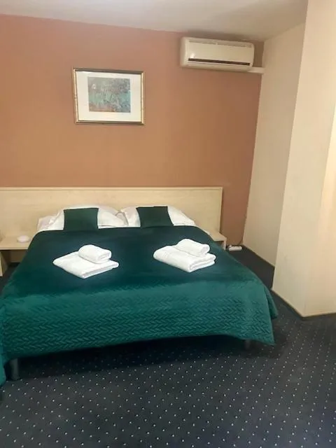 Bed in Hotel Pacific