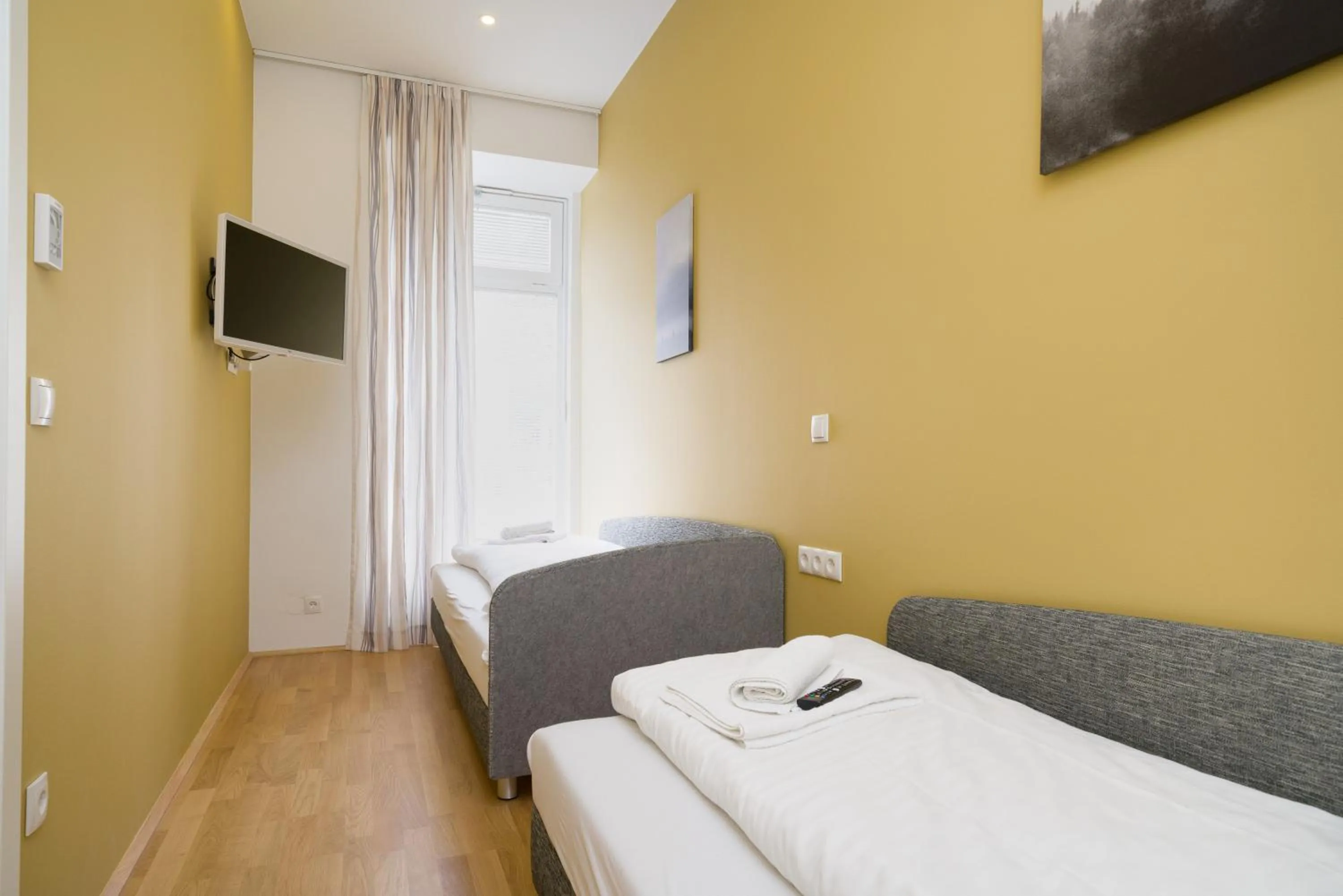 Bed in Vienna Stay Apartments or Rooms 1050