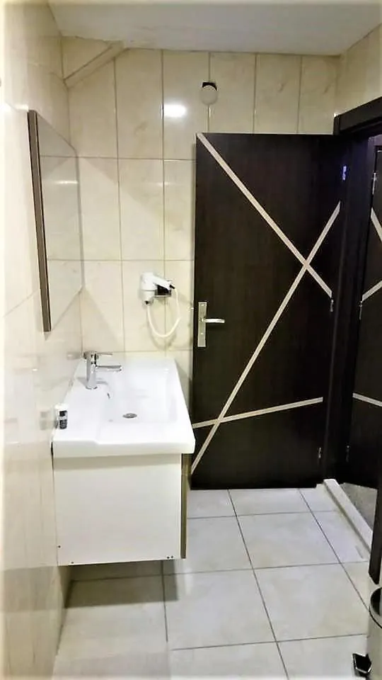 Shower in Waha Hotel