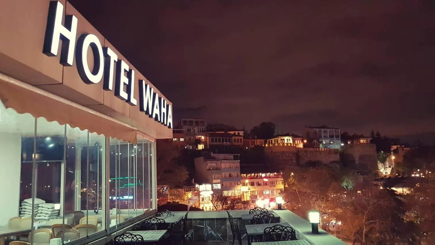 Property logo or sign in Waha Hotel