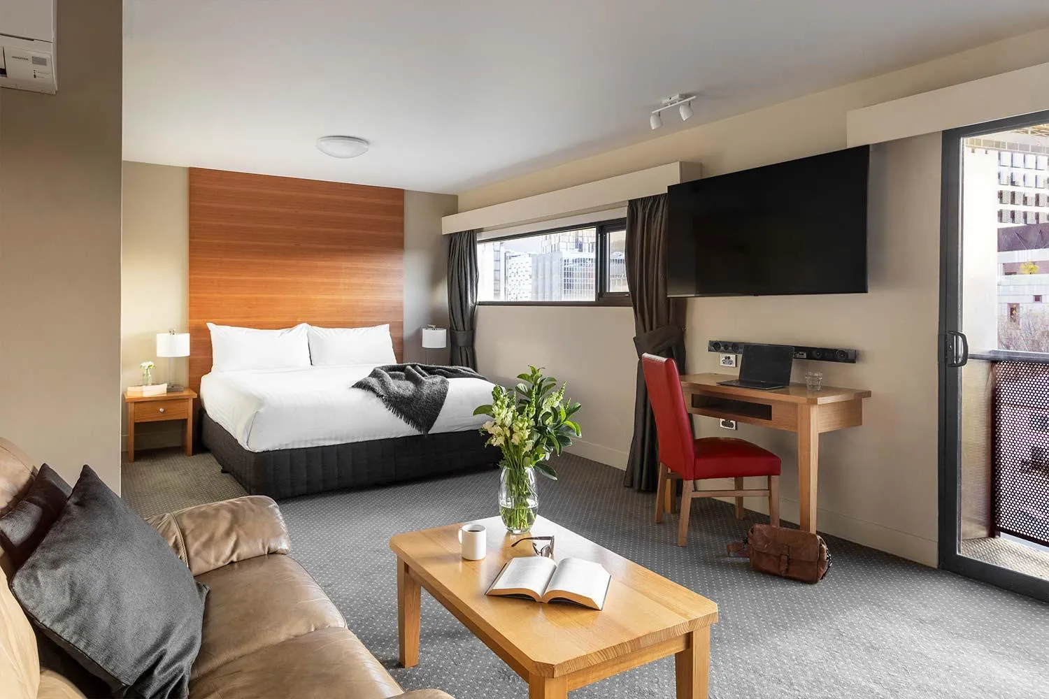 Living room, Bed in The Old Woolstore Apartment Hotel