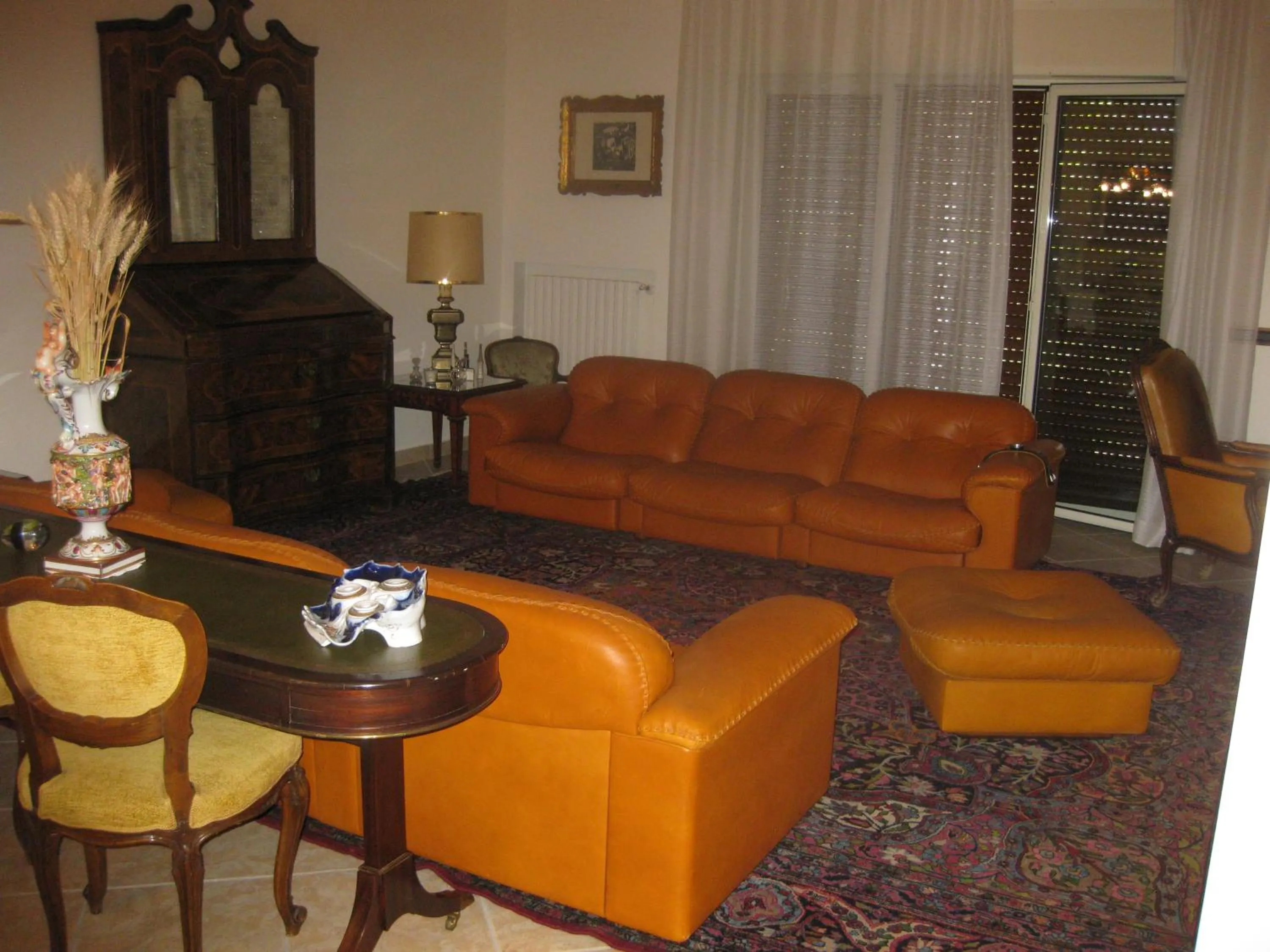 Communal lounge/ TV room in B&B Villa Lucia