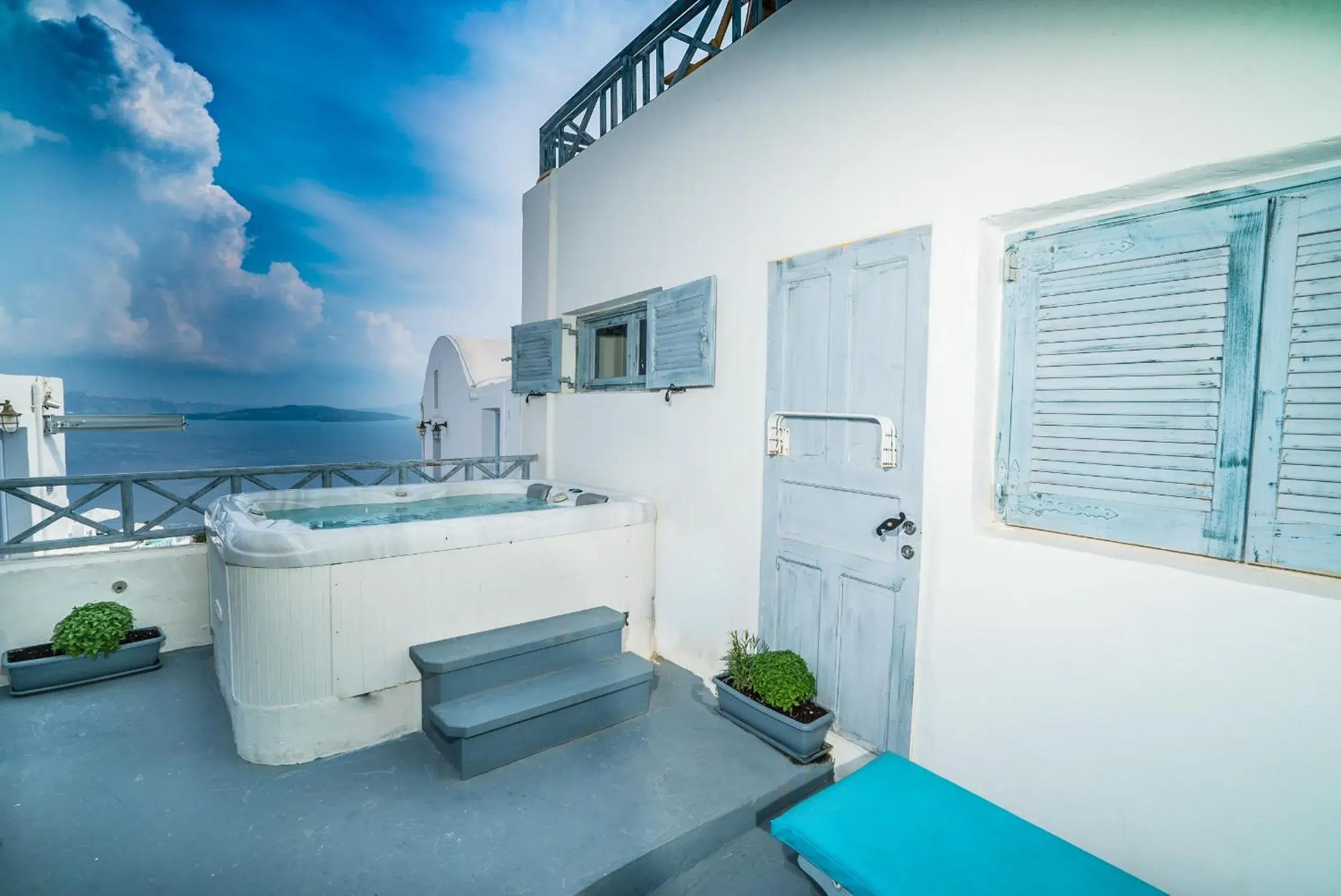 Two Bedroom Cave House with Outdoor Hot Tub and Caldera View in Kaleidoscope Cave Houses Two Bedroom Cave House with Outdoor Hot Tub and Caldera View in Kaleidoscope Cave Houses