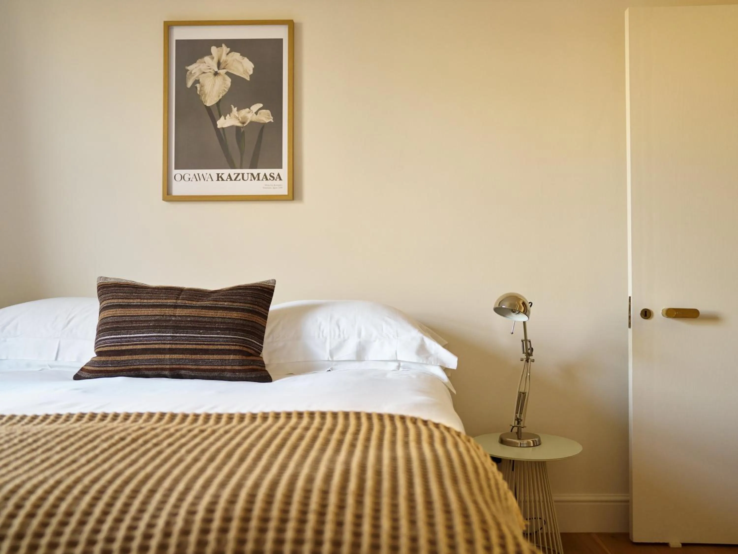 Bed in Europa House Apartments