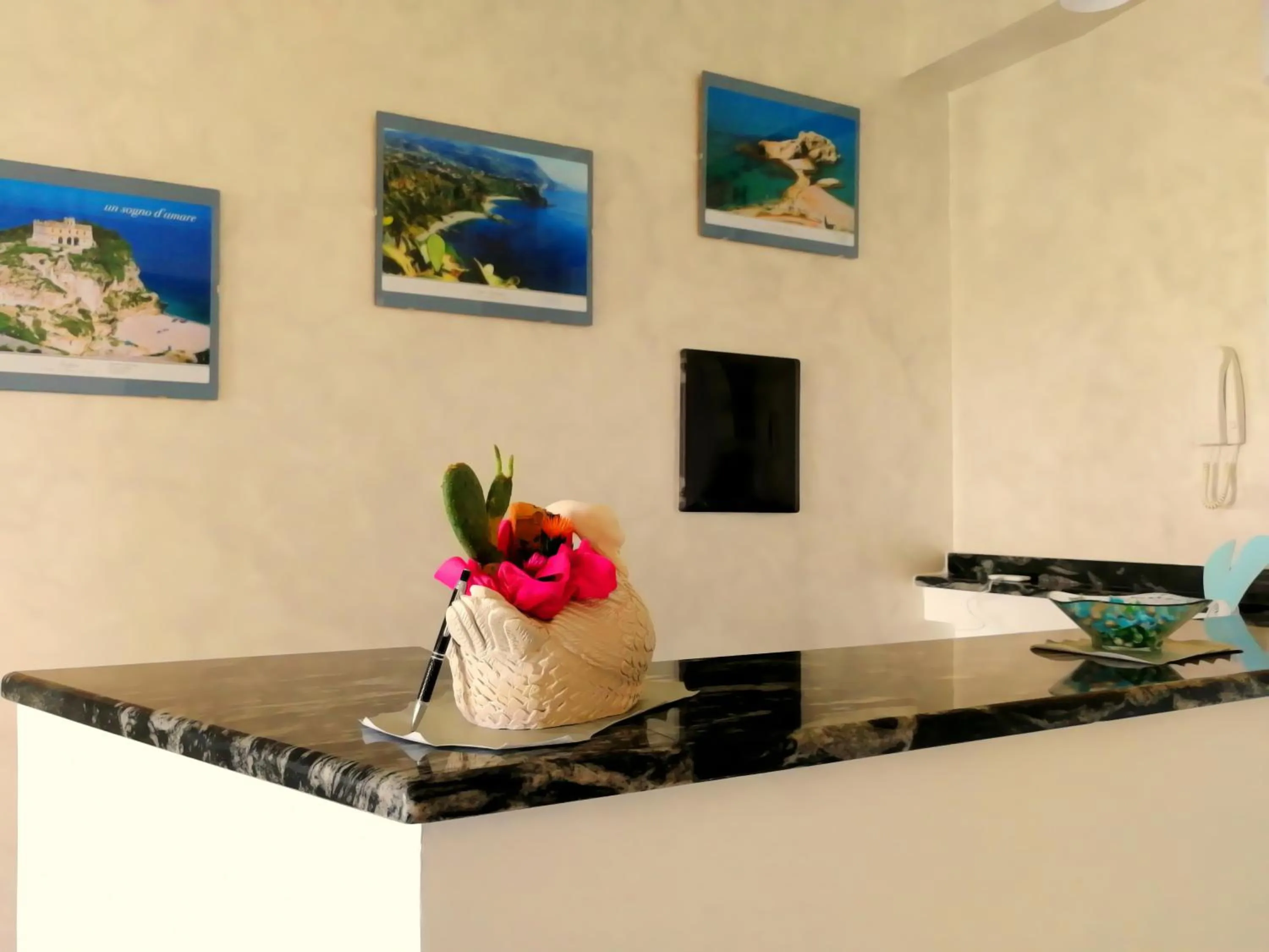 Communal lounge/ TV room in B&B Le Ninfe